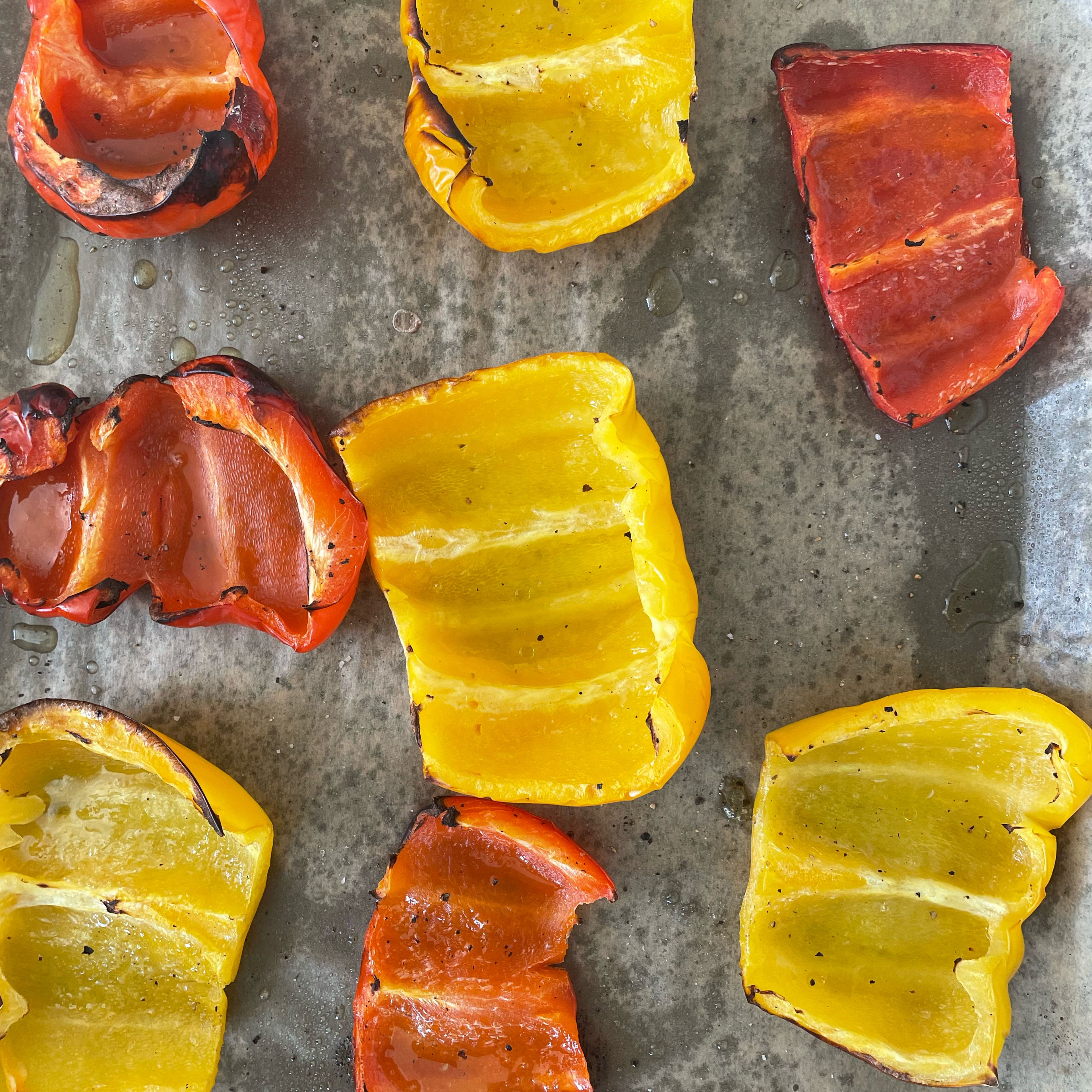 Cut the peppers into quarters and place them on a baking tray. Season with olive oil and a pinch of salt and pepper. Bake at 180 degrees for 25 minutes.