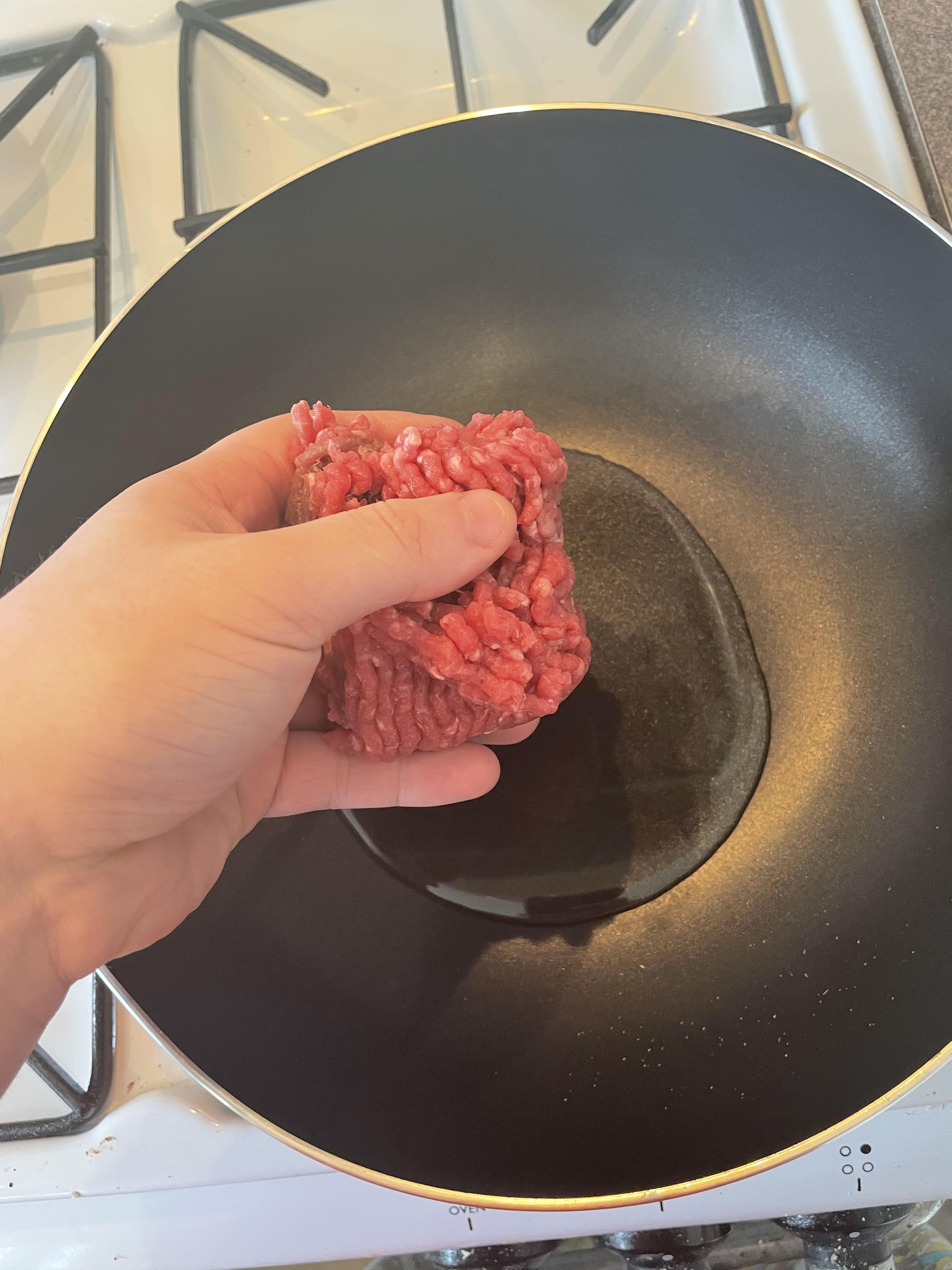 Now for the relaxing bit, add some olive oil to a frying pan and fry the mince adding a handful at a time until all brown through out once you have fried all the mince drain the excess water out and put this to one side.