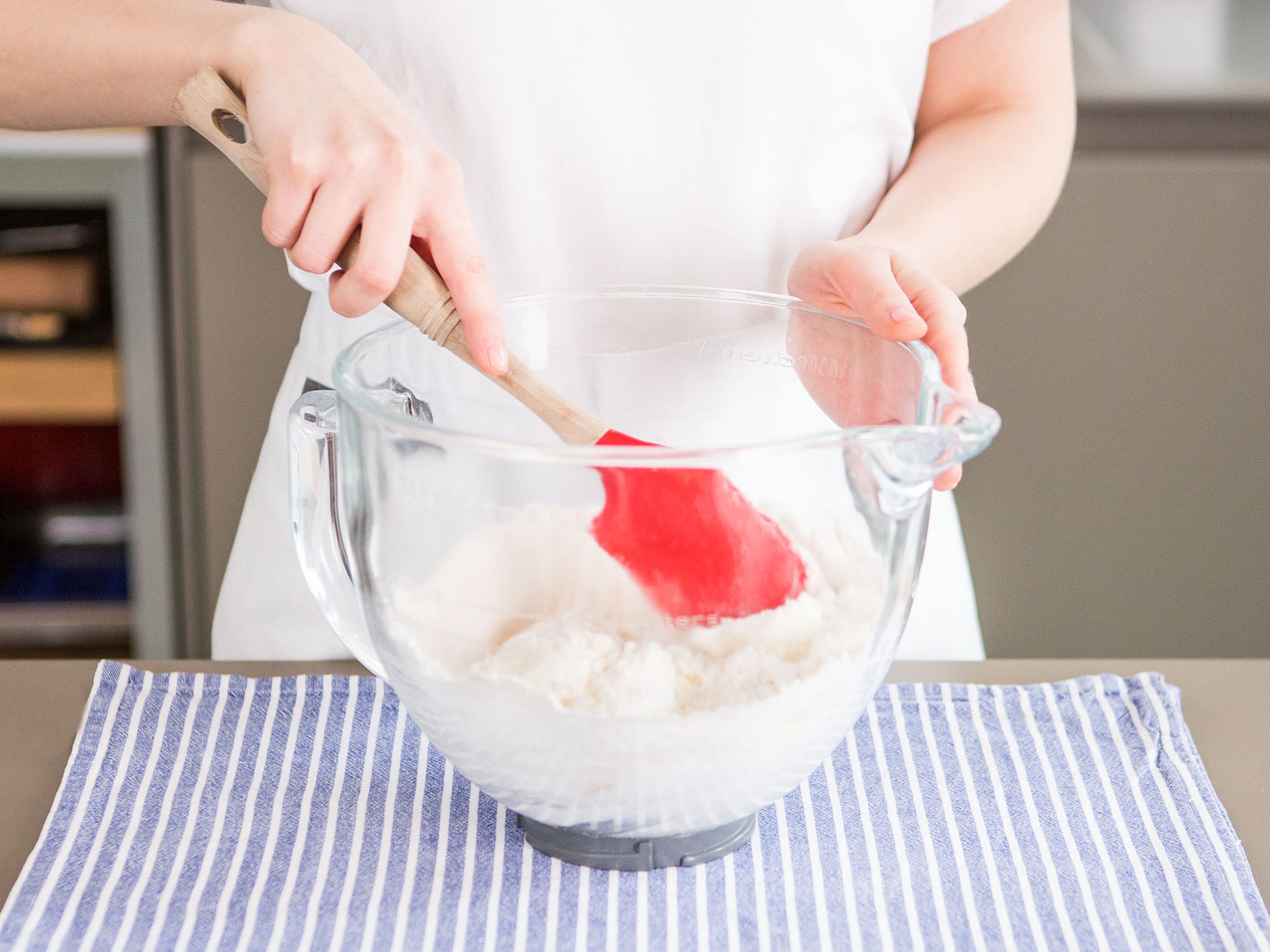 Carefully fold sugar and almond mixture into egg whites.
