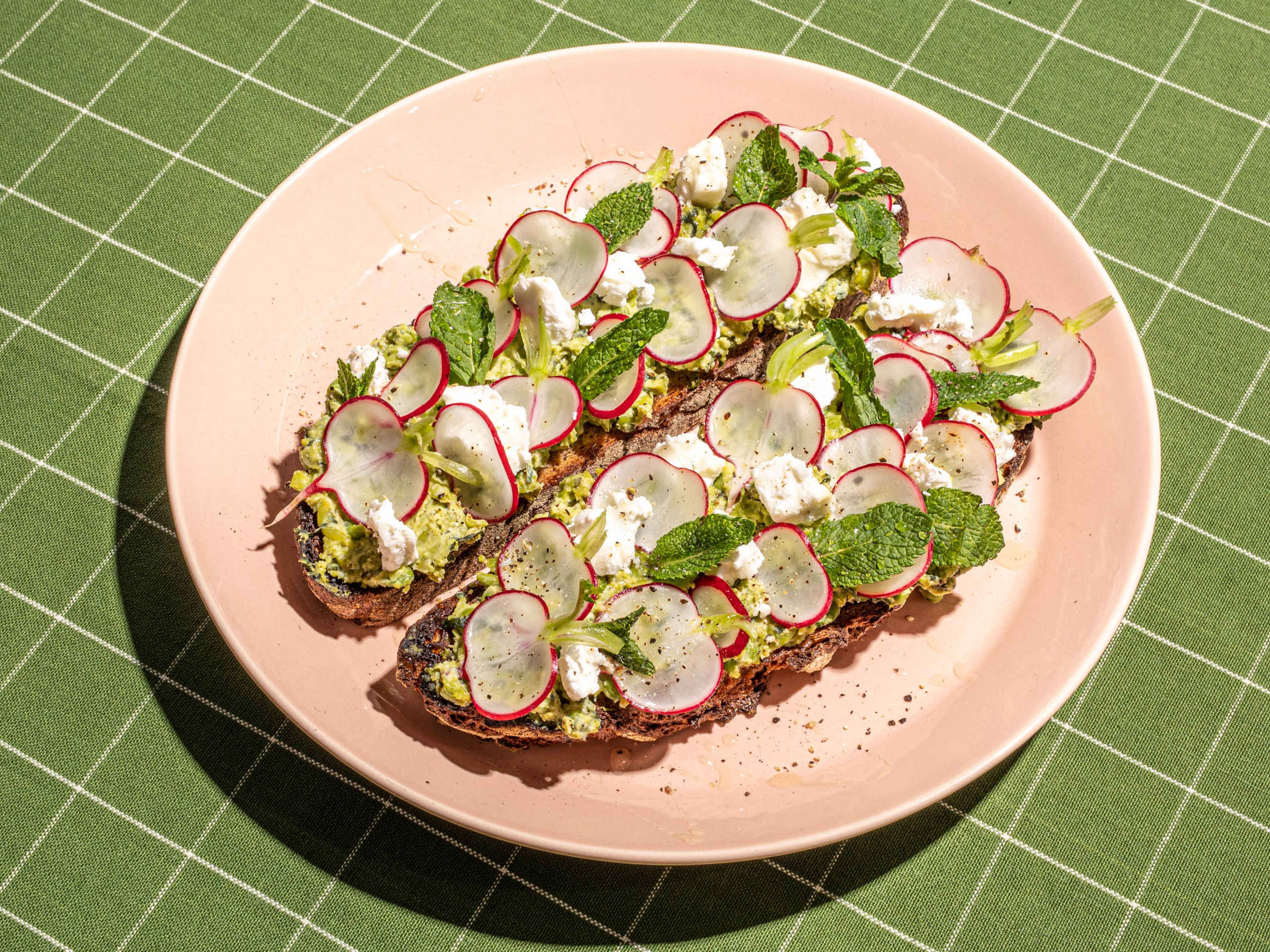 Smashed green pea and feta toasts