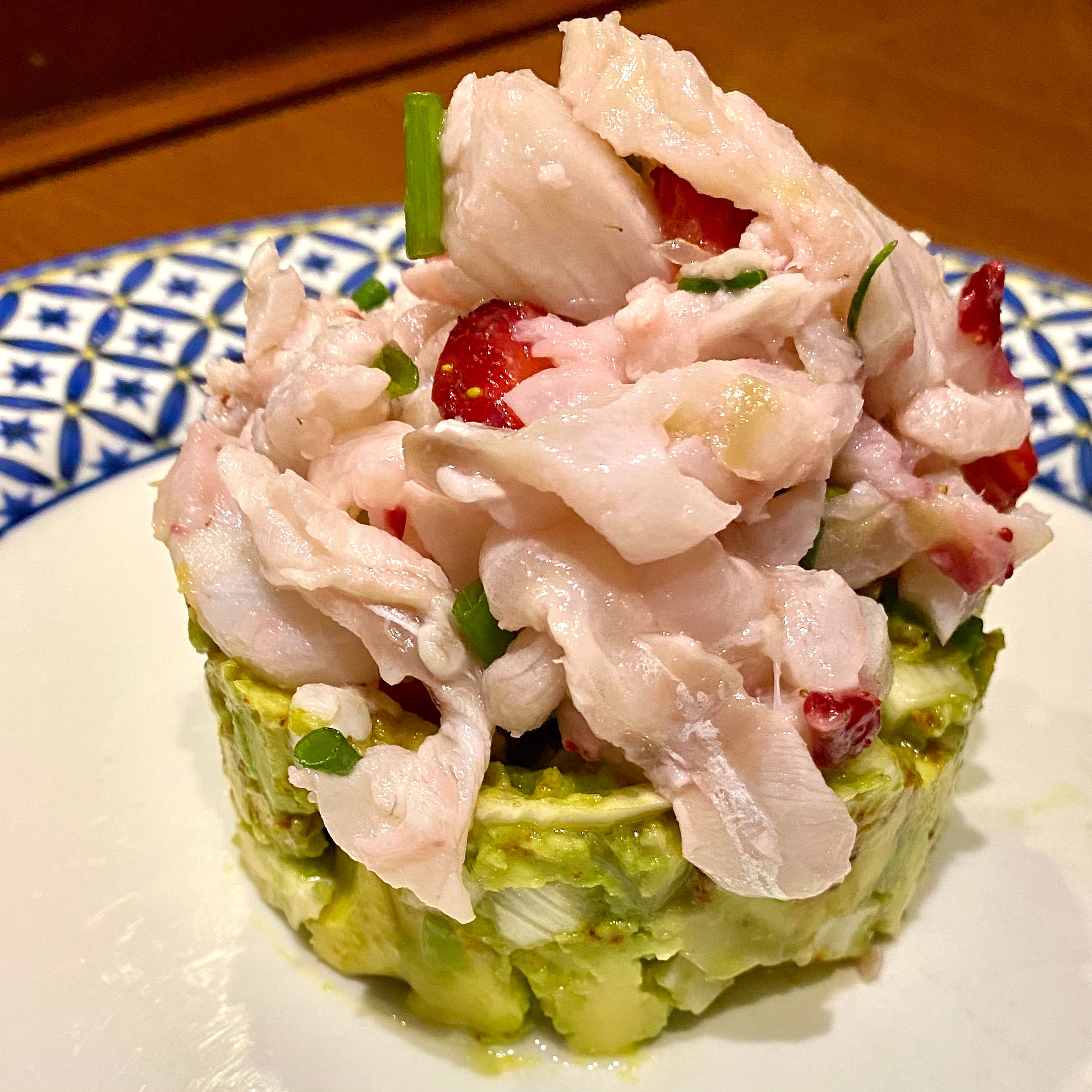 Set the avocado and fennel tartare on the bottom and top with the ceviche. Sprinkle with chives and enjoy!