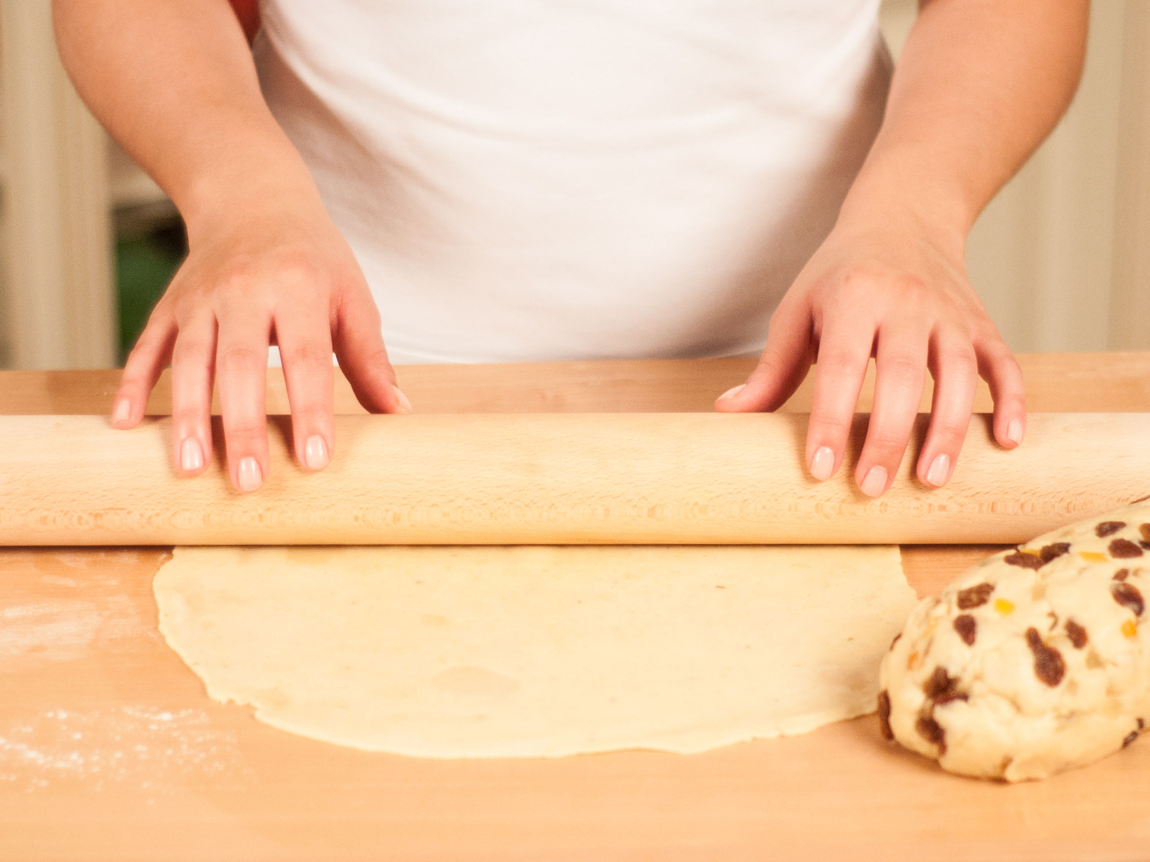 Roll fruit dough into a log. On a lightly floured surface roll out remaining dough to a large oval.