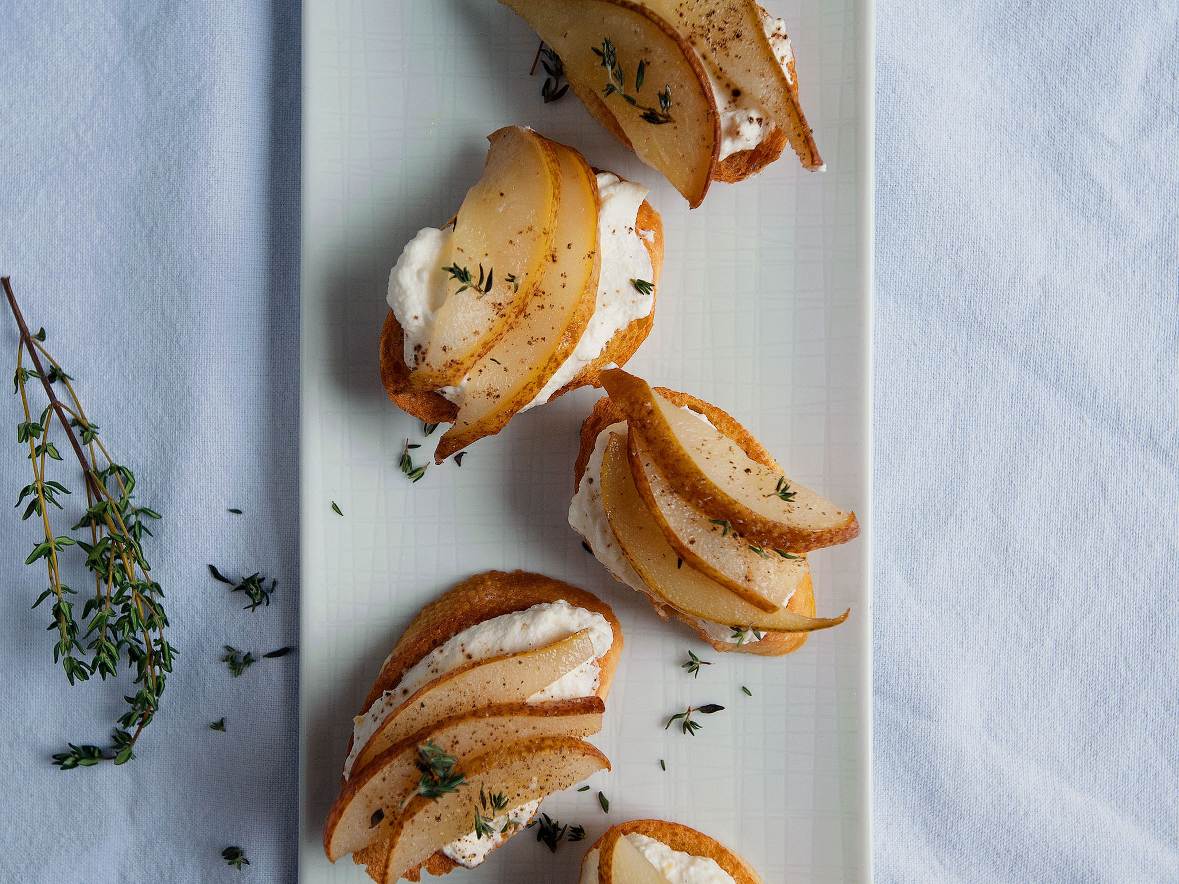Ricotta toasts with honey-roasted pears
