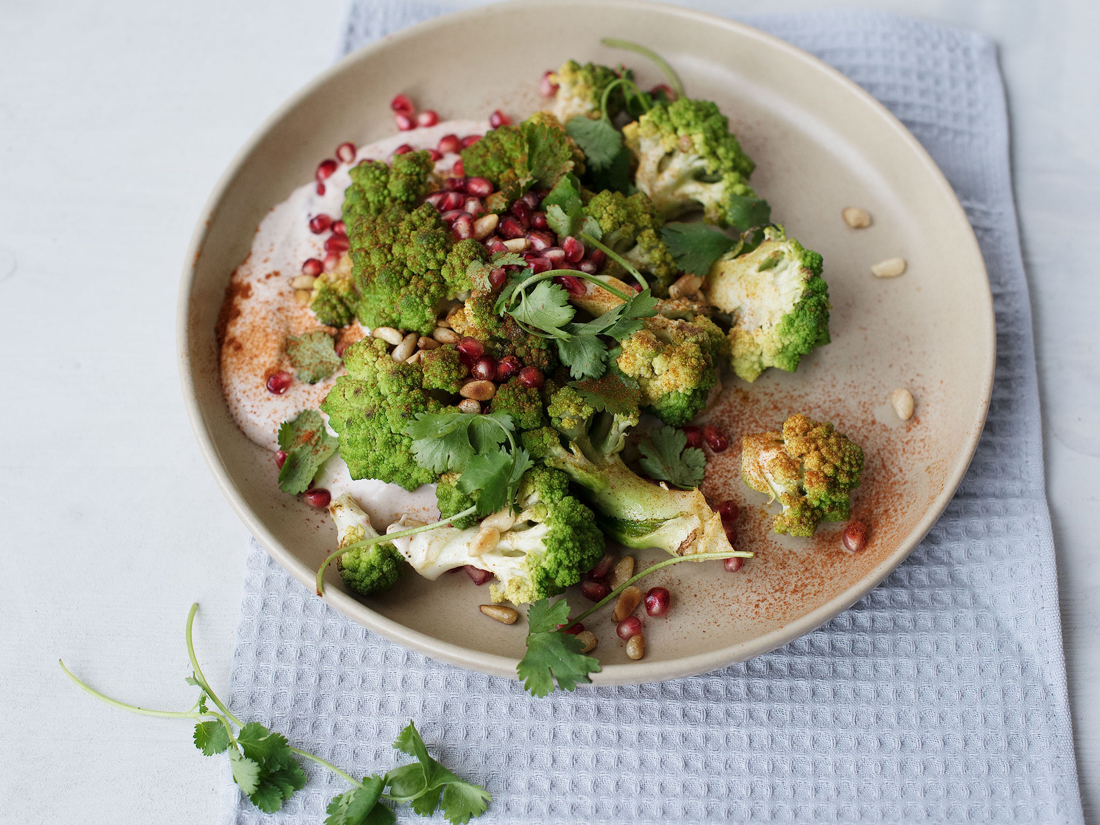 Roasted Romanesco salad with pomegranate aioli