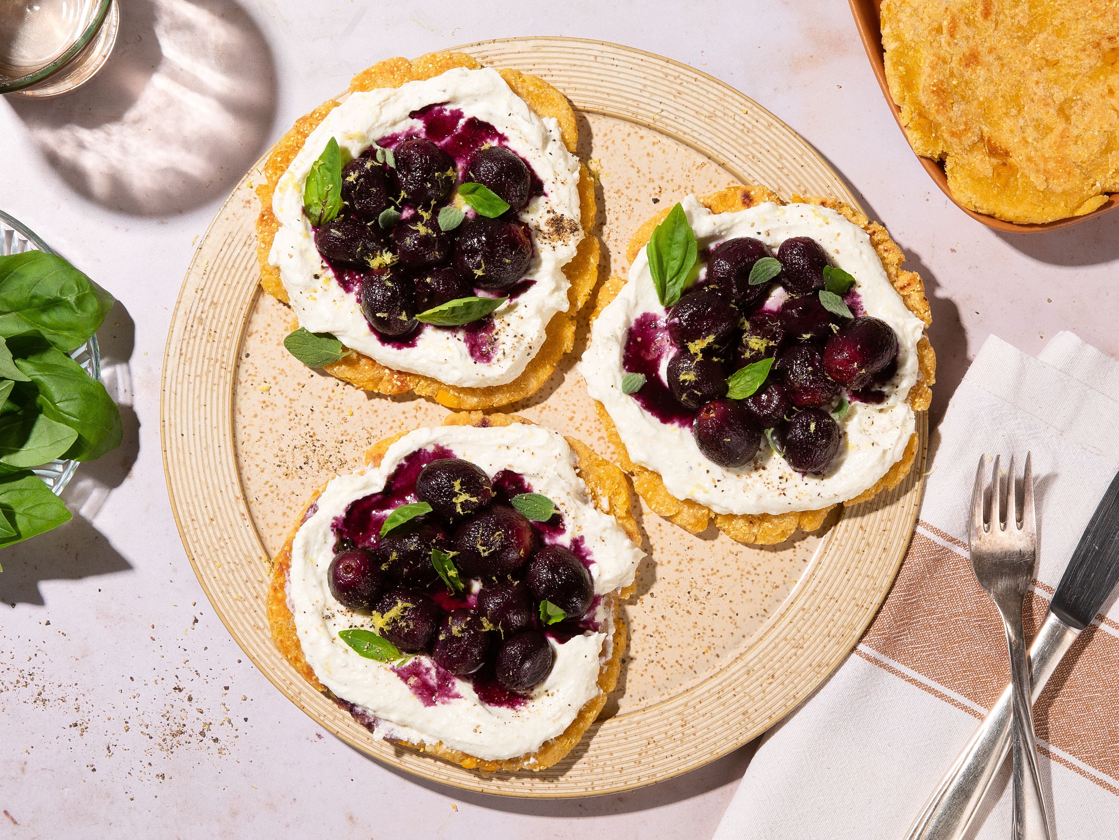 Roasted balsamic grapes with whipped feta on corn flatbreads