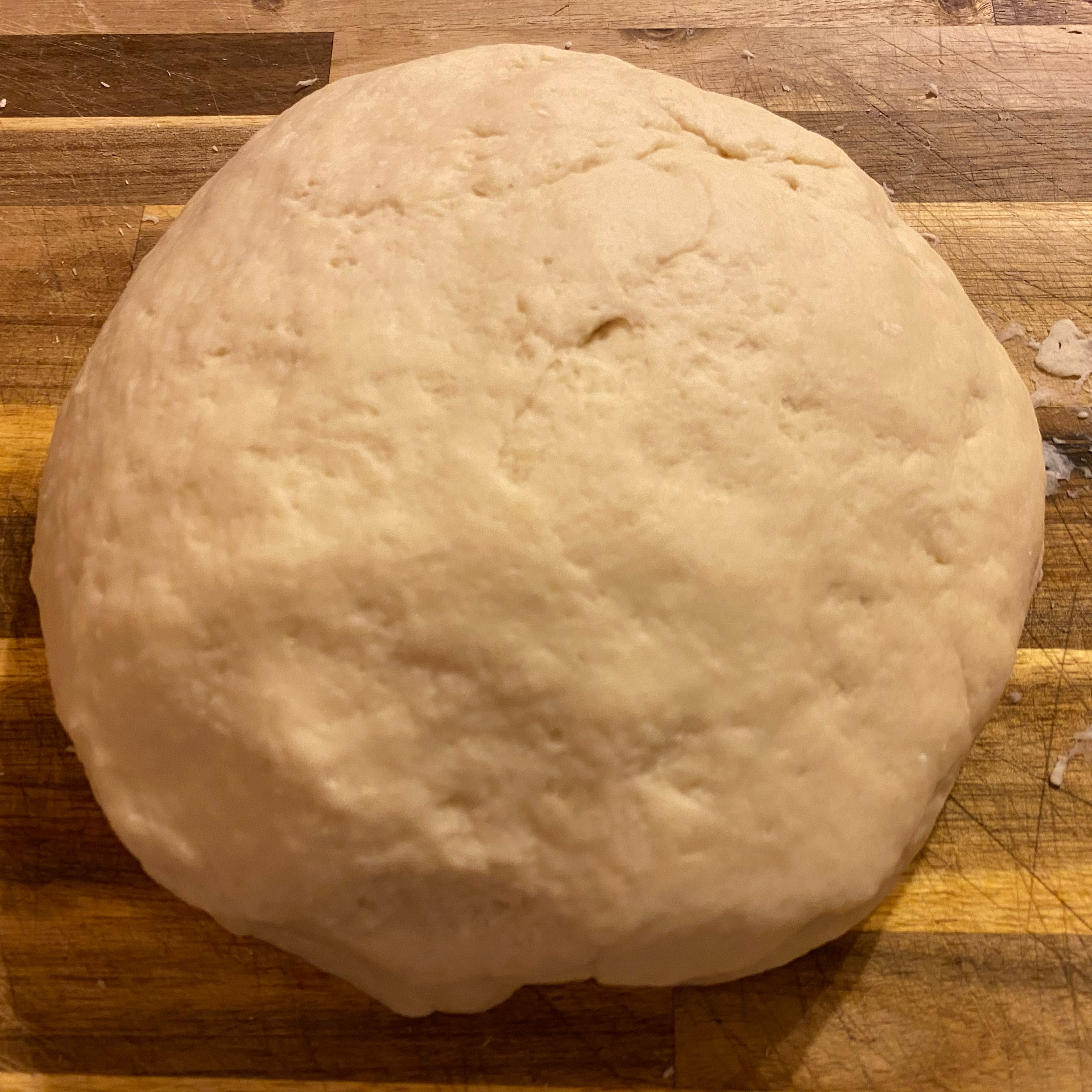 Remove the chilled dough from the fridge and divide evenly into 12 sections. Roll into golf sized balls.