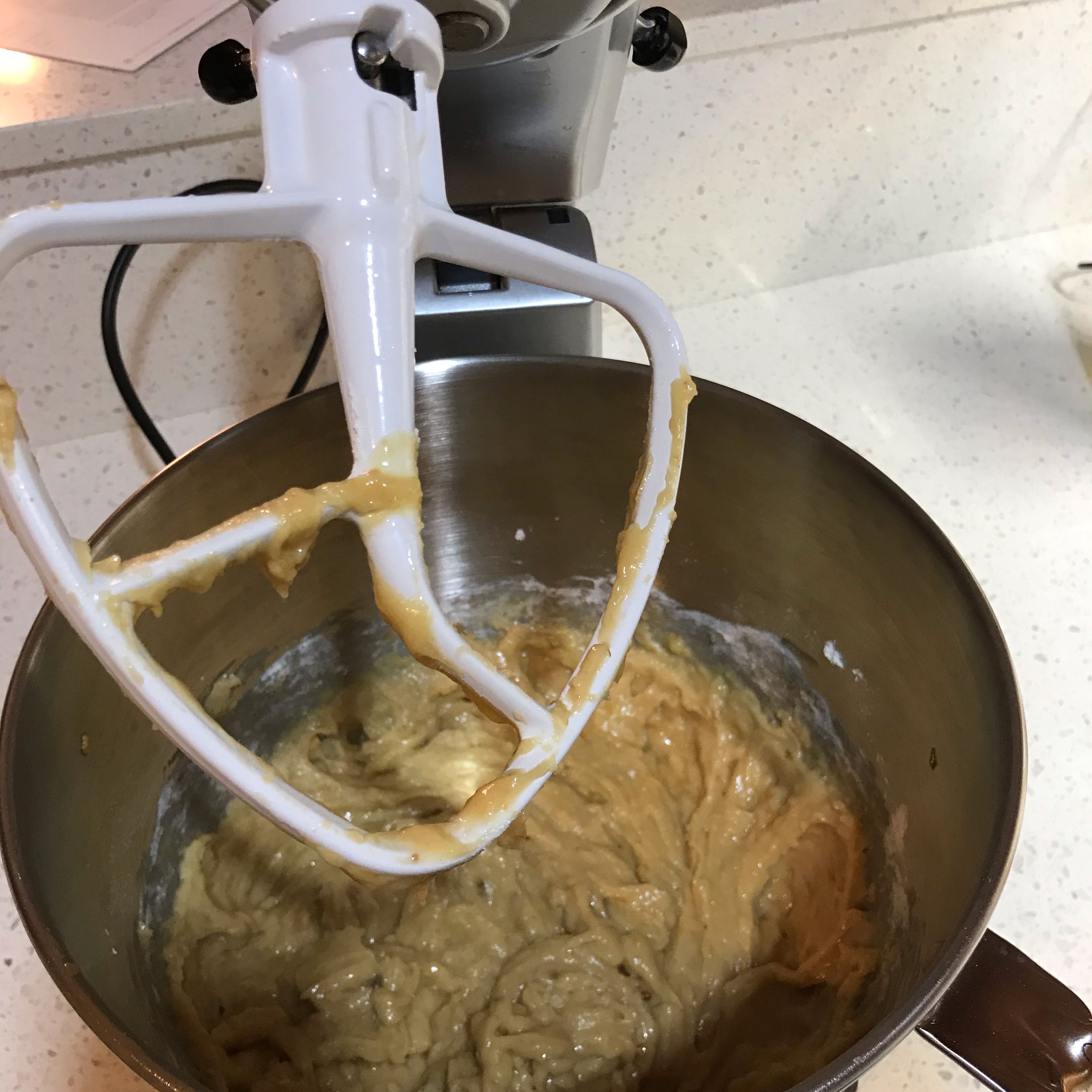 Add the flour, baking soda & baking powder into the mixing bowl. Use the low setting, mix thoroughly until no dry spots remain. Don’t overwork the batter.