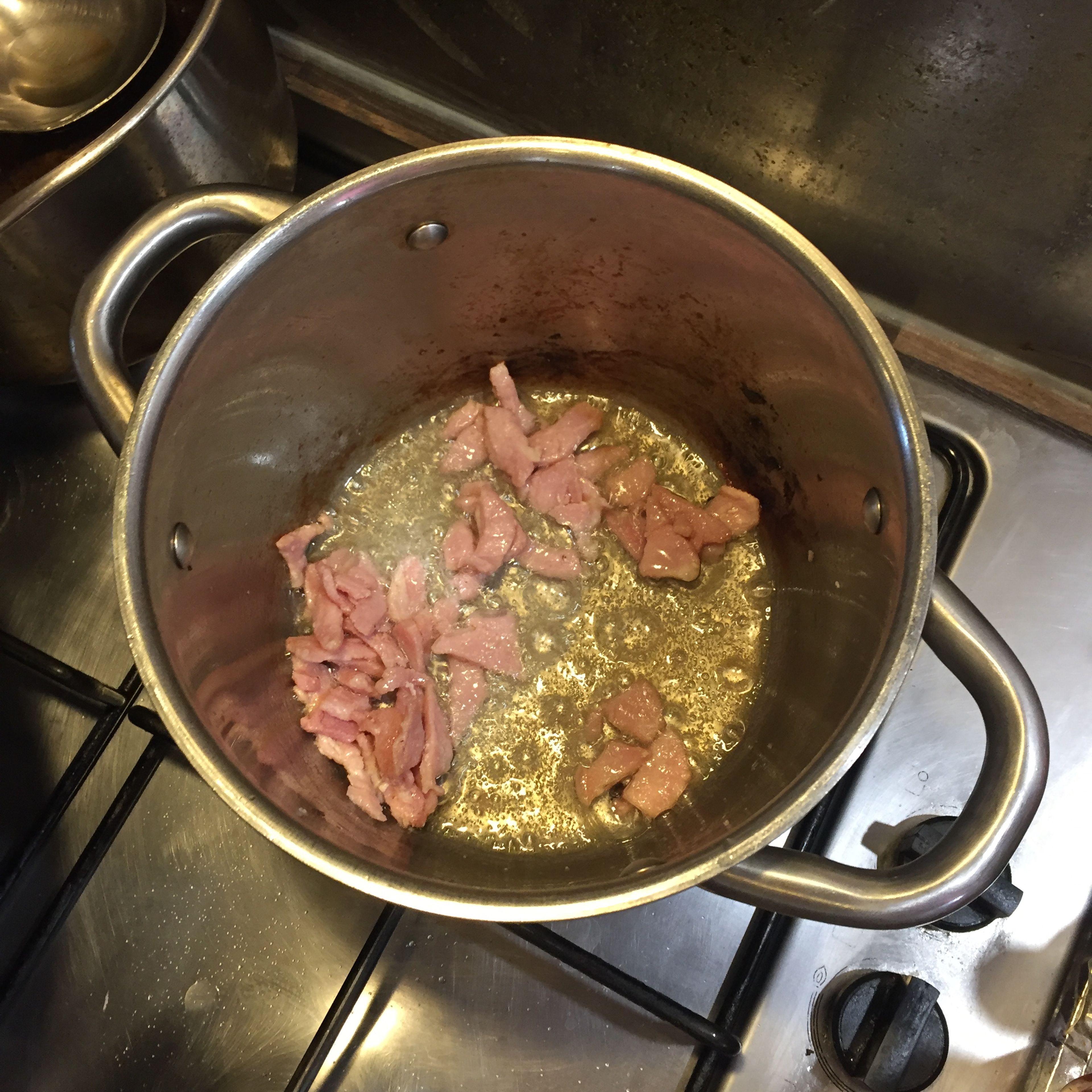 add the oil. Once it’s hot, add the bacon and fry till it’s cooked and brown. Remove the bacon
