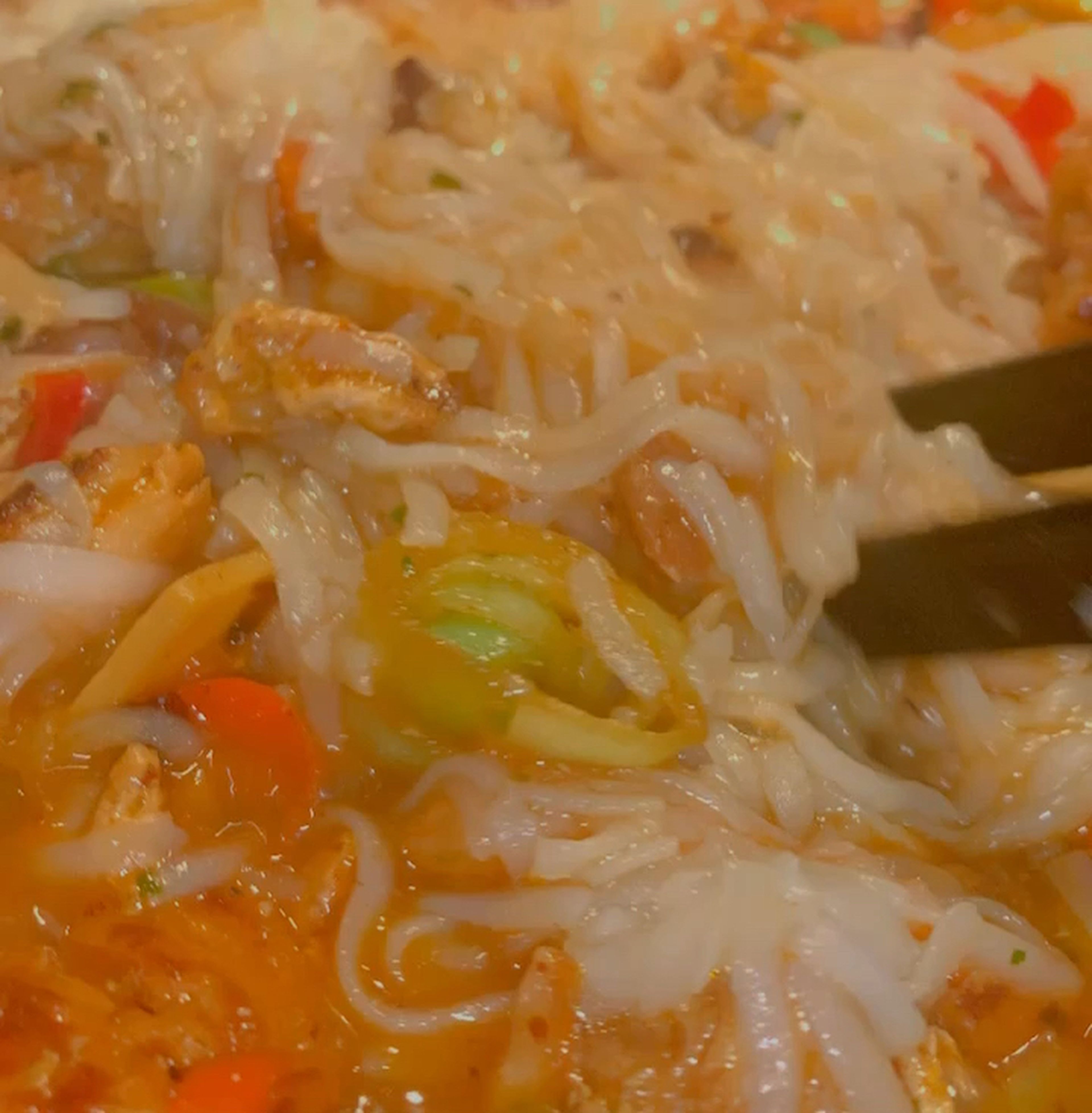 Once the vegetables are soft and the noodles are cooked. Drain the noodles and add them in. 