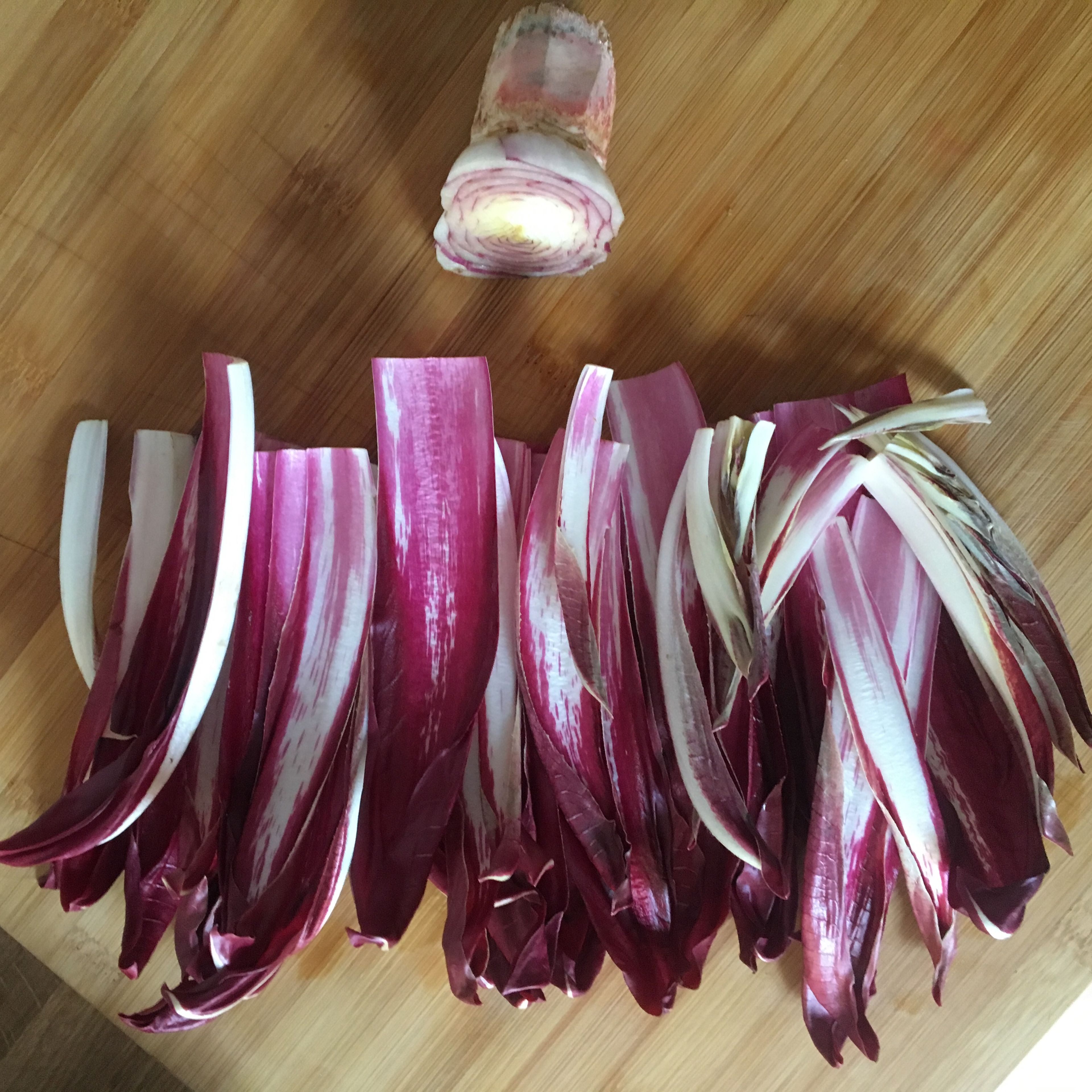 Remove the stalk from the radicchio.