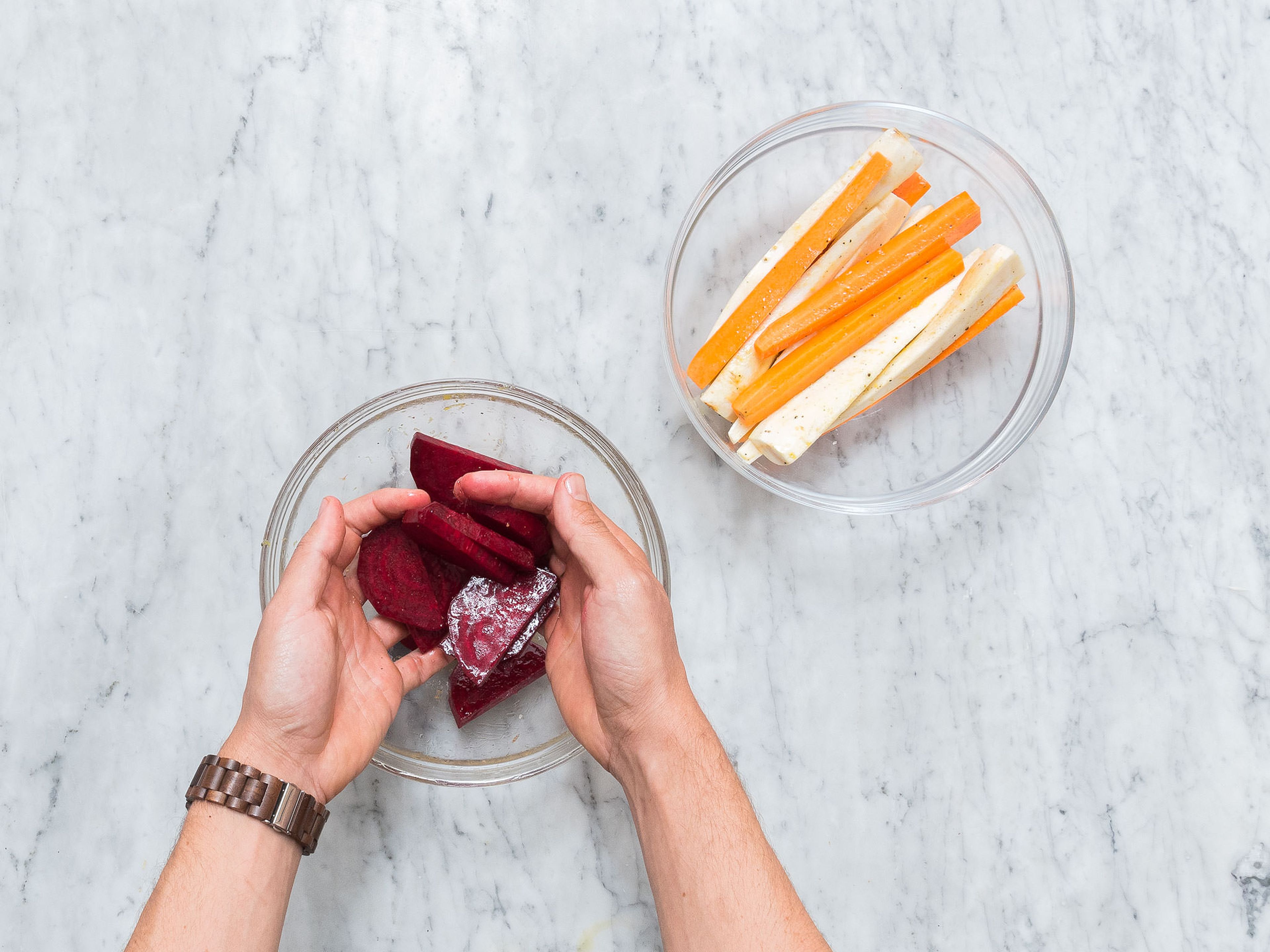 Pre-heat oven to 200°C/390°F. Peel carrots and parsnips and quarter them lengthwise. Peel and halve beetroot, then cut into 1-cm/0.4-in. slices. In a bowl, combine the vegetables with lemon zest and olive oil. Season with salt and pepper.