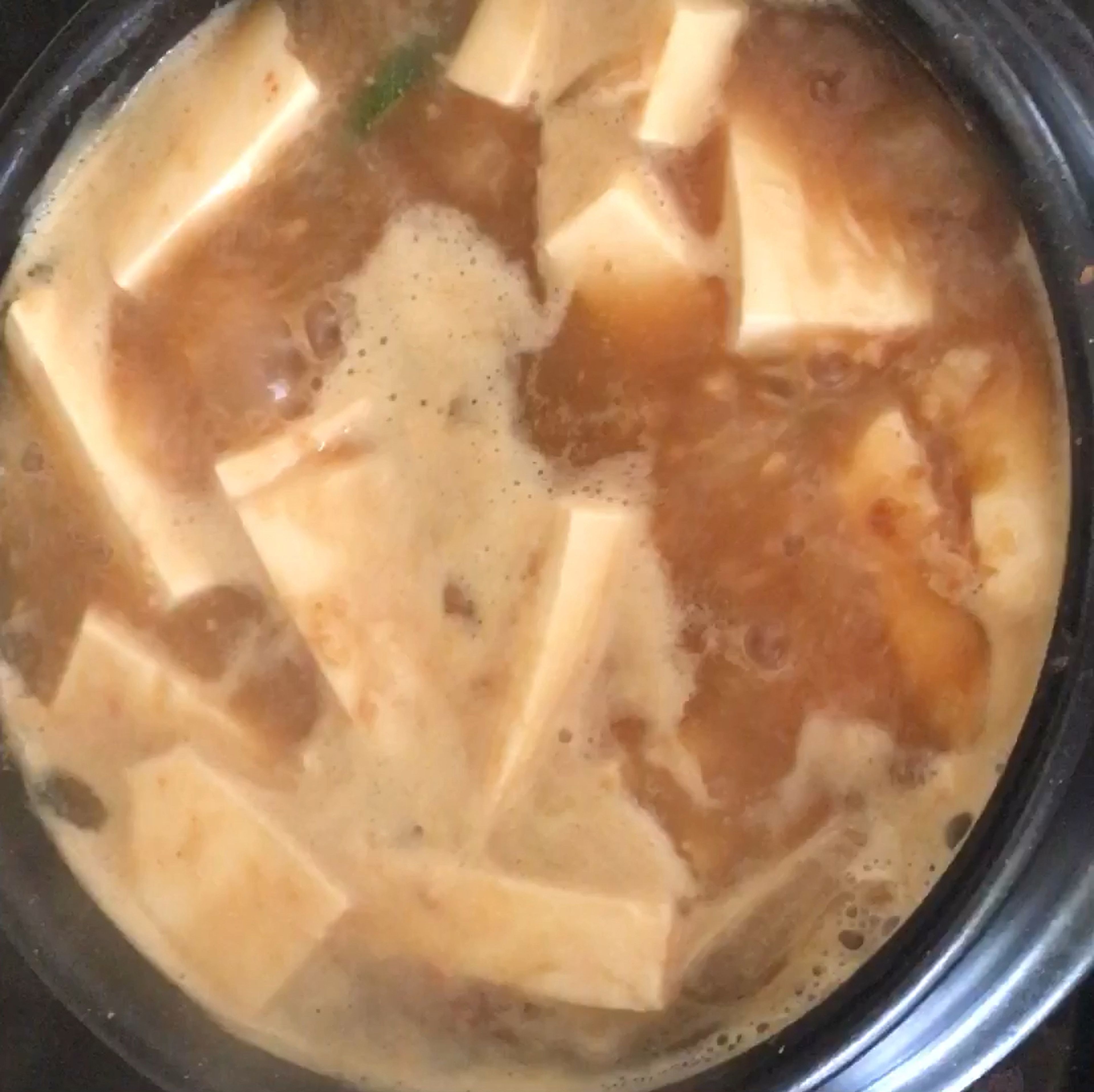 Add the onion and potato first into the soup and boil over medium heat for 4-5min. Then throw in the rest of ingredient and boil for another 4-5 min. Lastly add the tofu and let is simmer for 3 min.