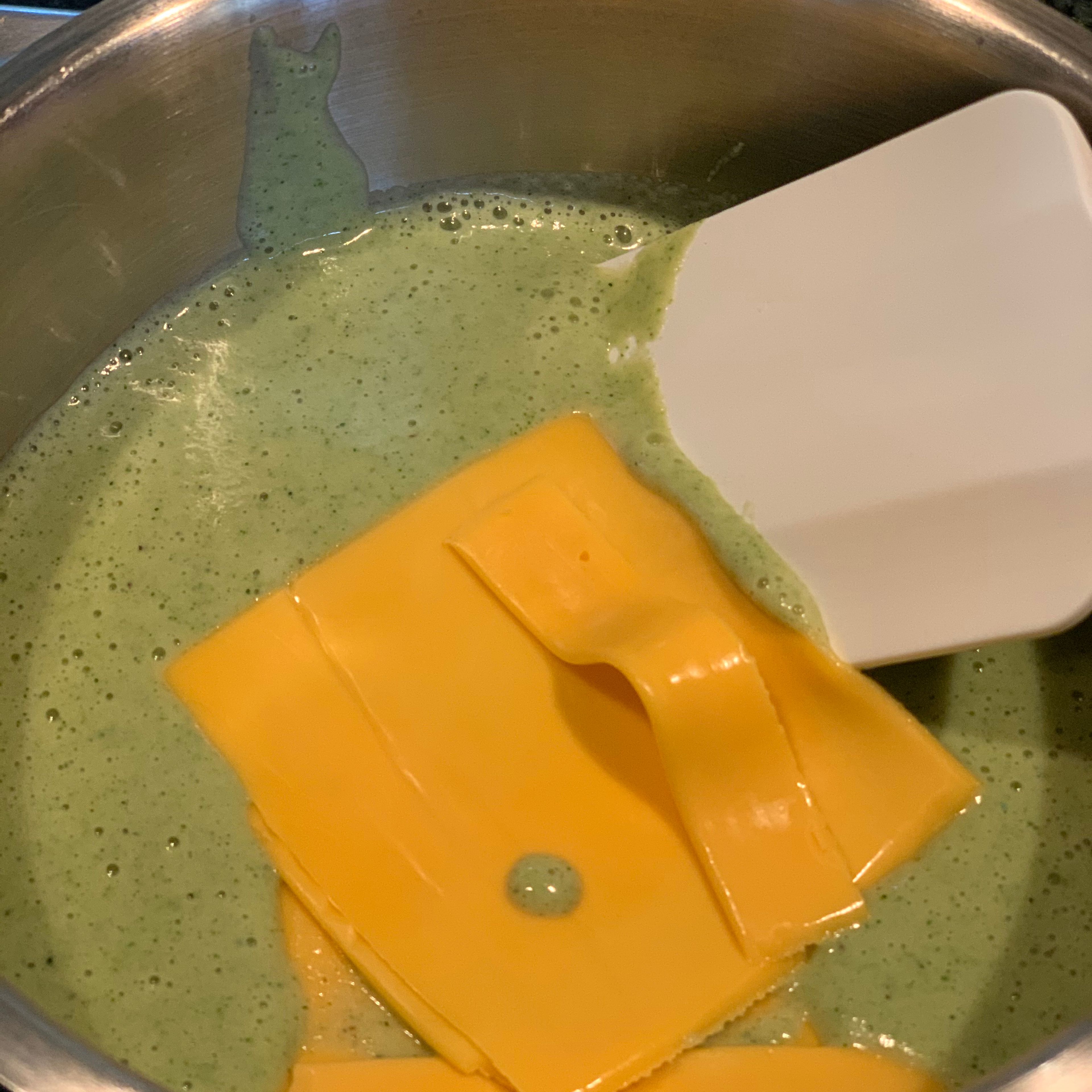 Add the American cheese and mix until fully combined.