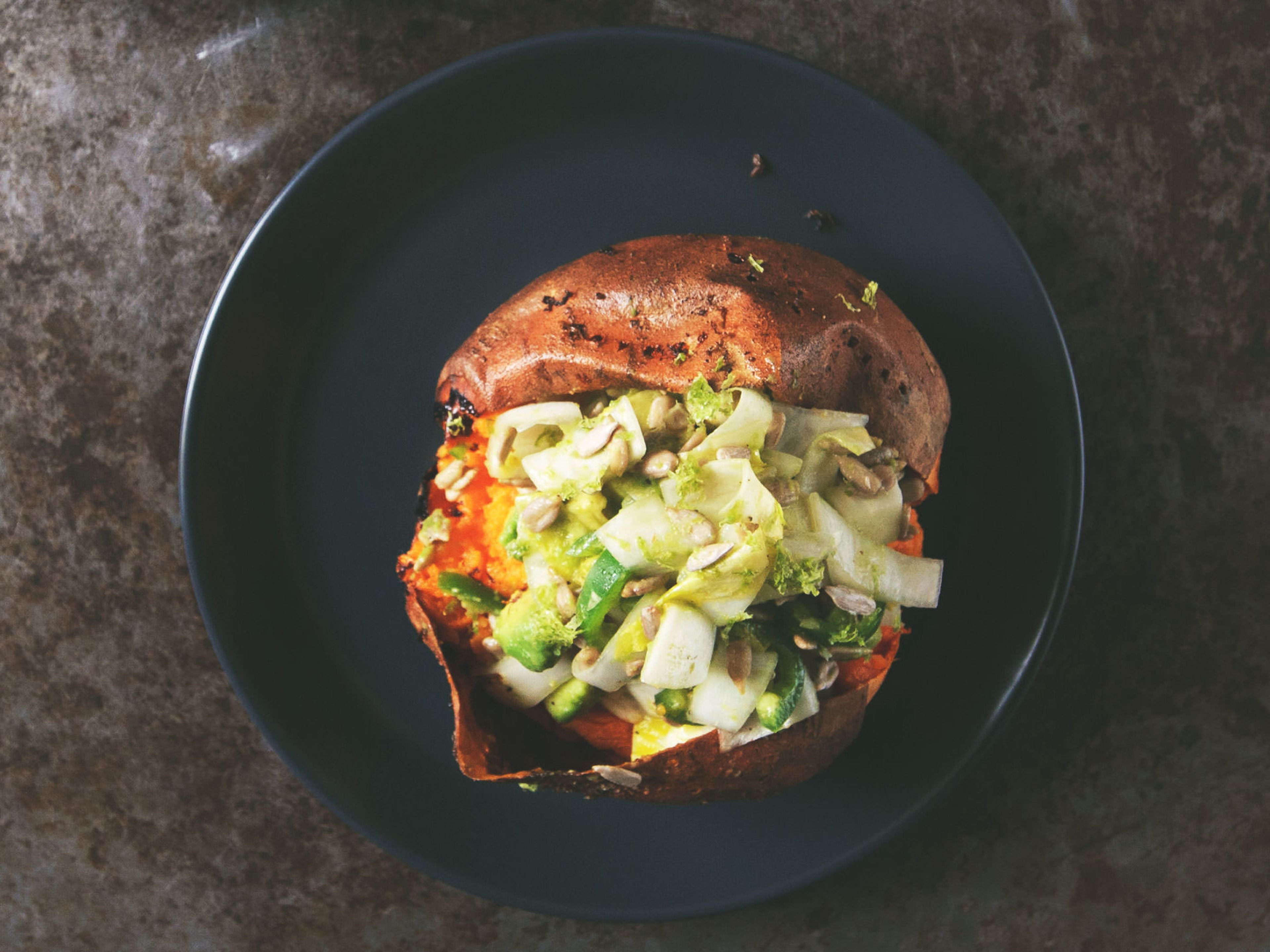 Baked sweet potatoes with zesty avocado filling