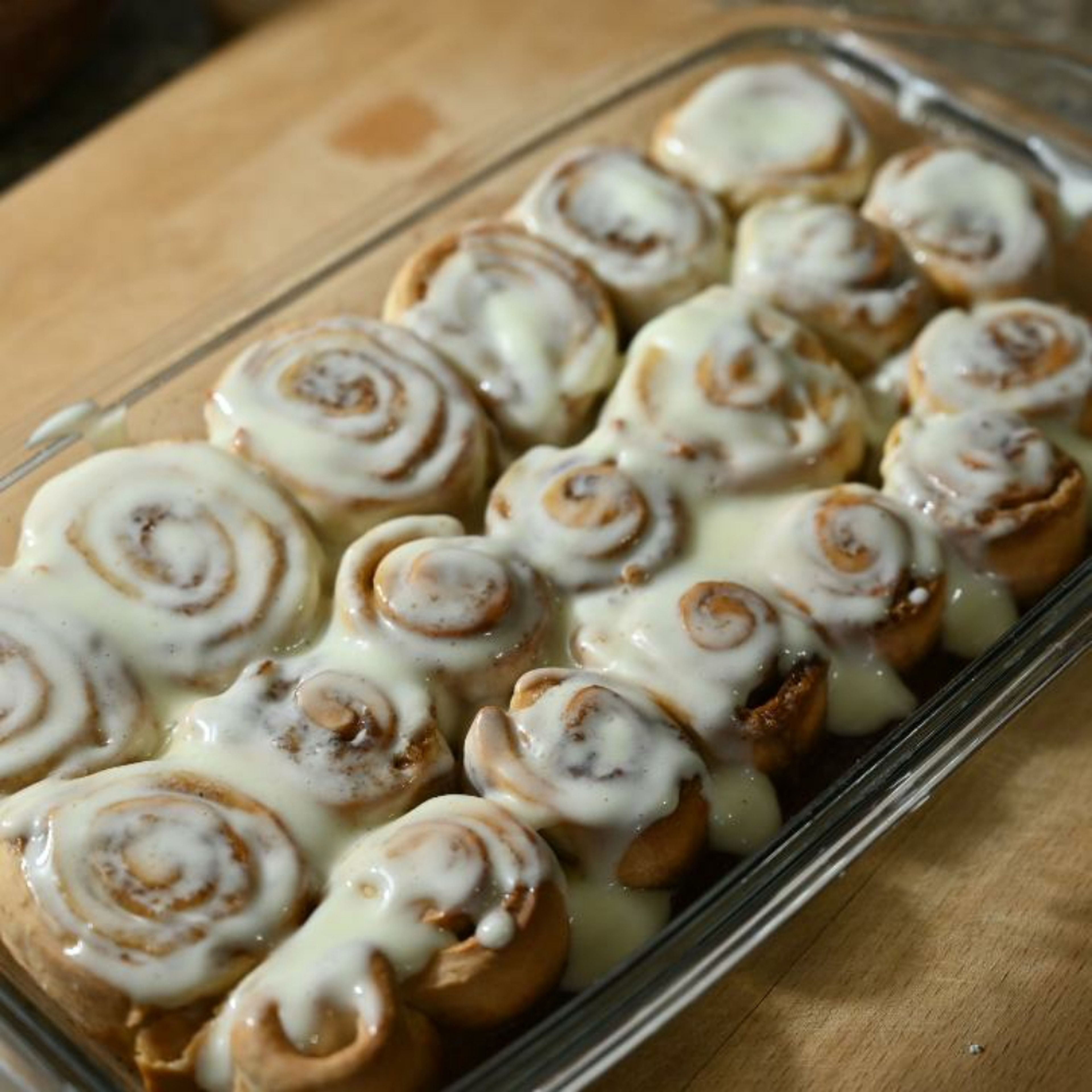 Drizzle the frosting over the cinnamon rolls.