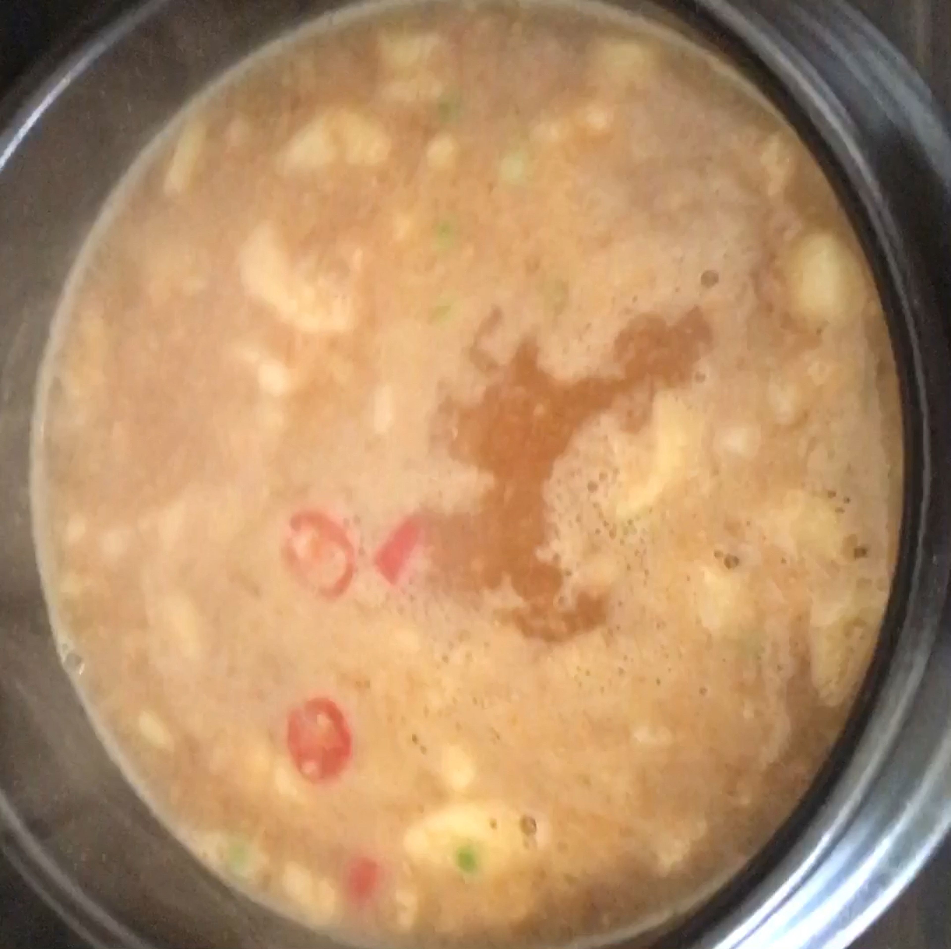Boil water in the pot and put 1 tbsp bean paste, garlic and chili into the water. Stir until the paste is fully dissolved. Taste the soup and add more bean paste if it’s too flat.