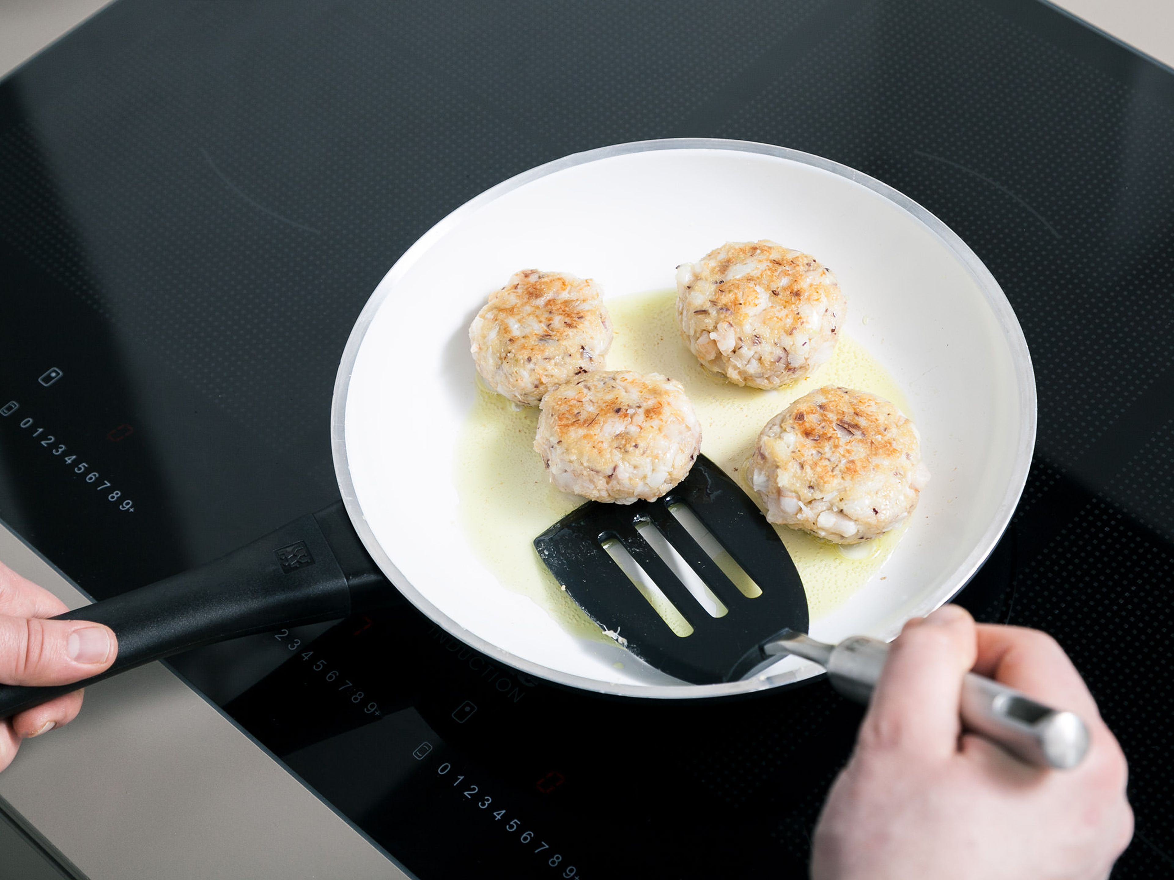 Fry fishcakes in batches for approx. 3 – 4 min. on either side or until golden brown, pressing down slightly to form a patty shape. Serve with salsa and garnish with basil. Enjoy!