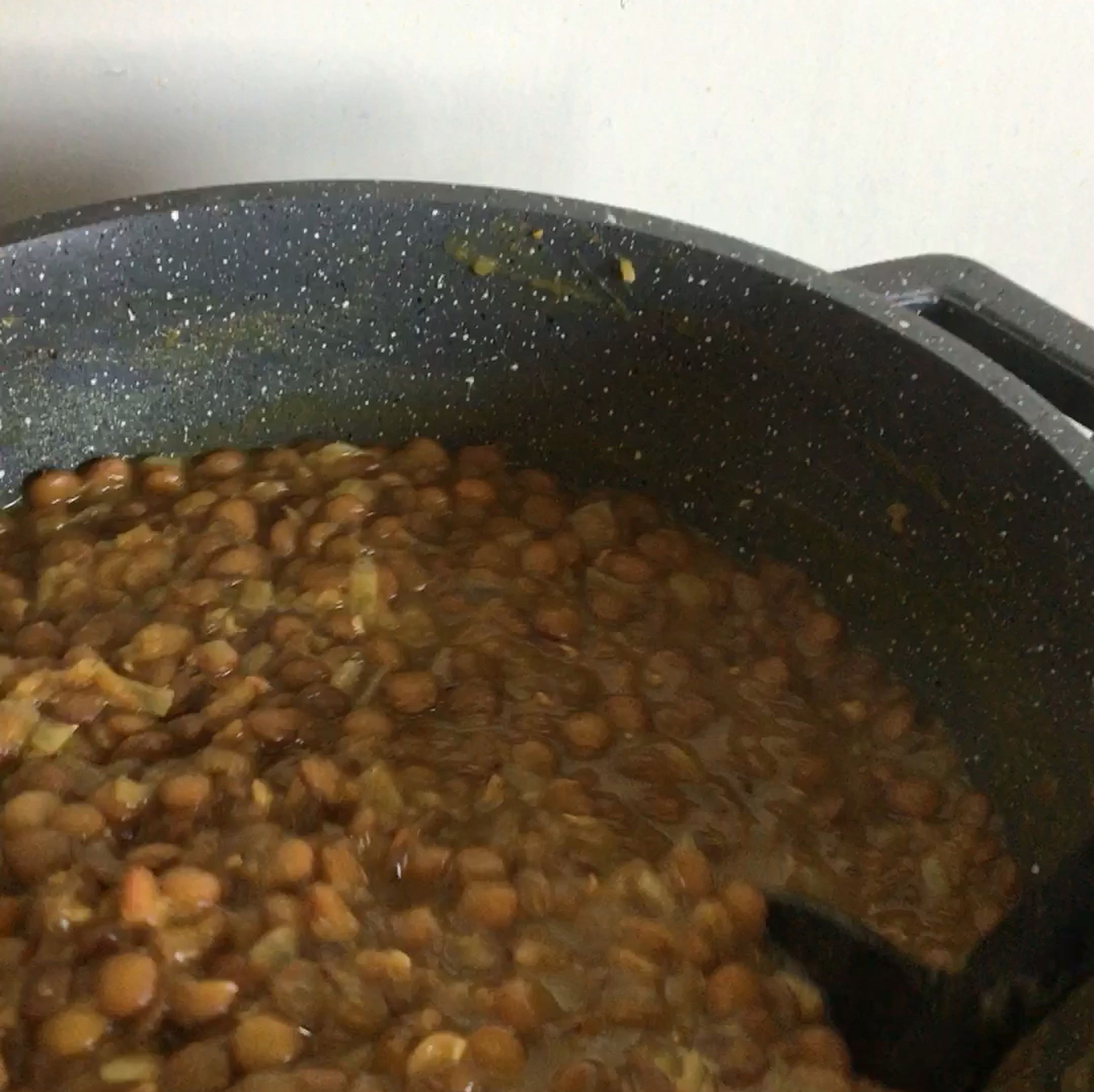 When the “adasi” is thick enough, taste and adjust the seasoning. Add some fresh lemon juice after removing from the heat.