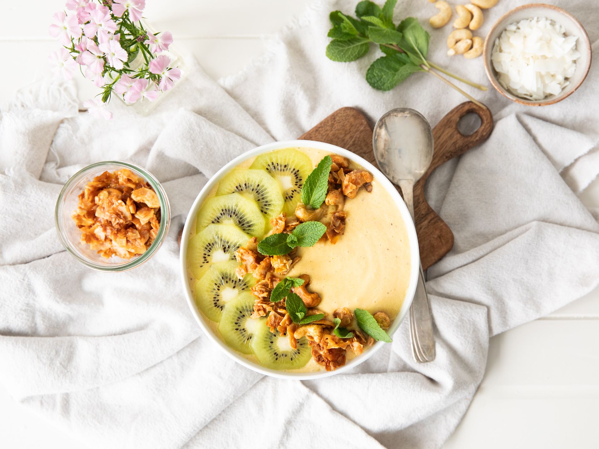 Honey-melon smoothie bowl with coconut granola