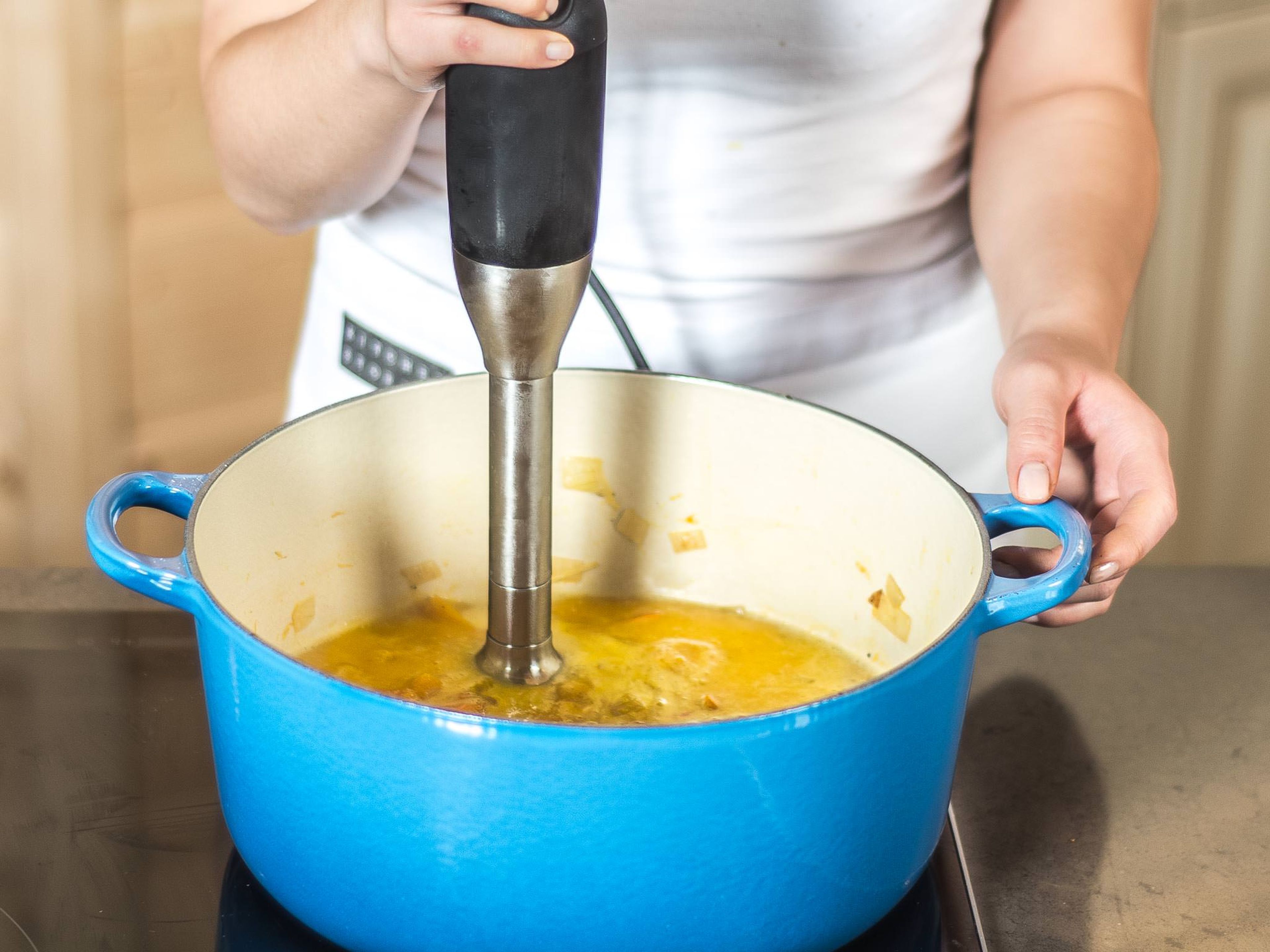 Remove the saucepan from the heat and puree the soup with a hand blender. To serve, fill a deep dish and garnish the soup with the candied pumpkin seeds and a few drops of pumpkin seed oil.