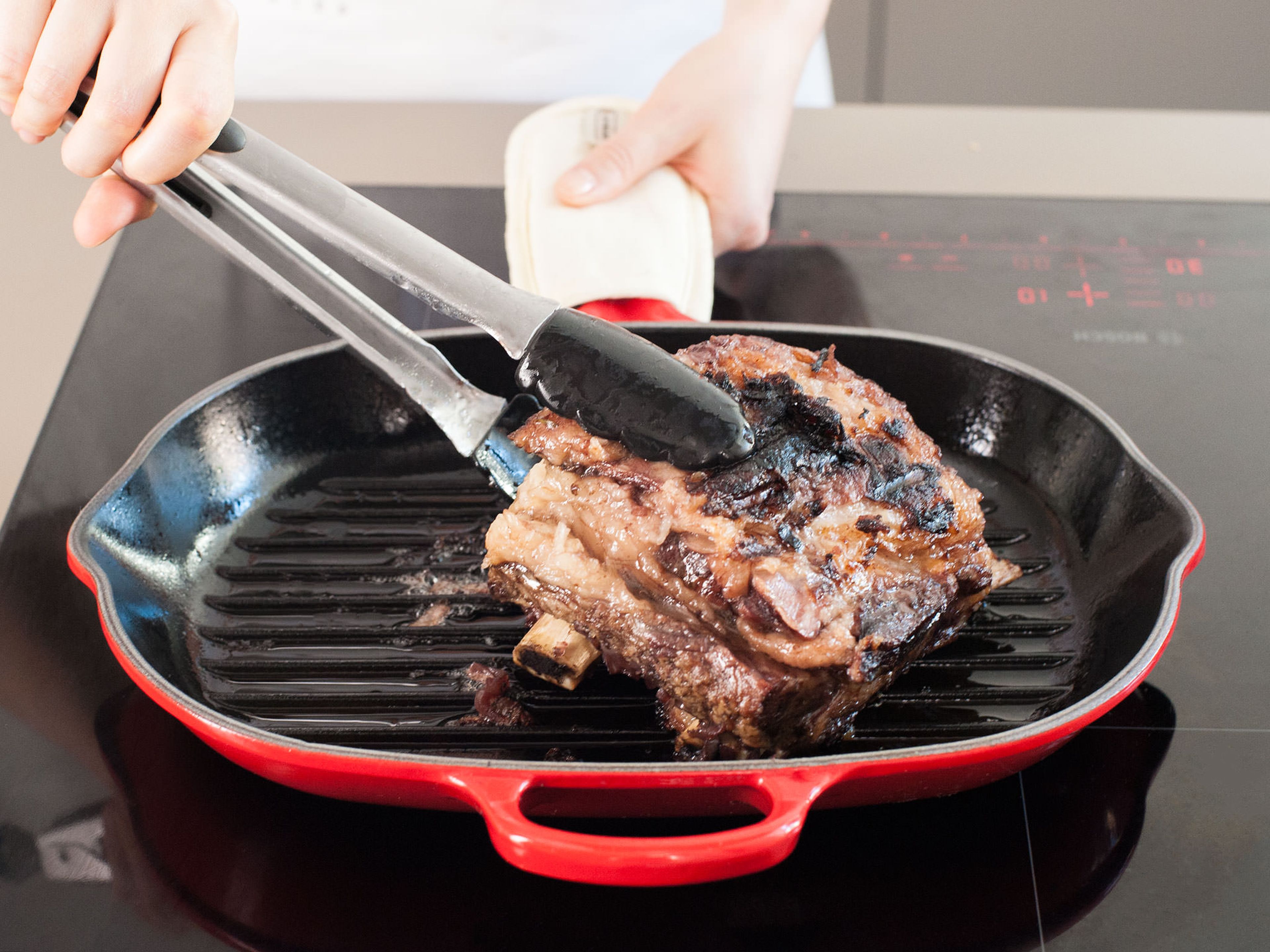 Heat a grill pan or grill to medium-high. Grill the short ribs until the skin is charred on all sides.
