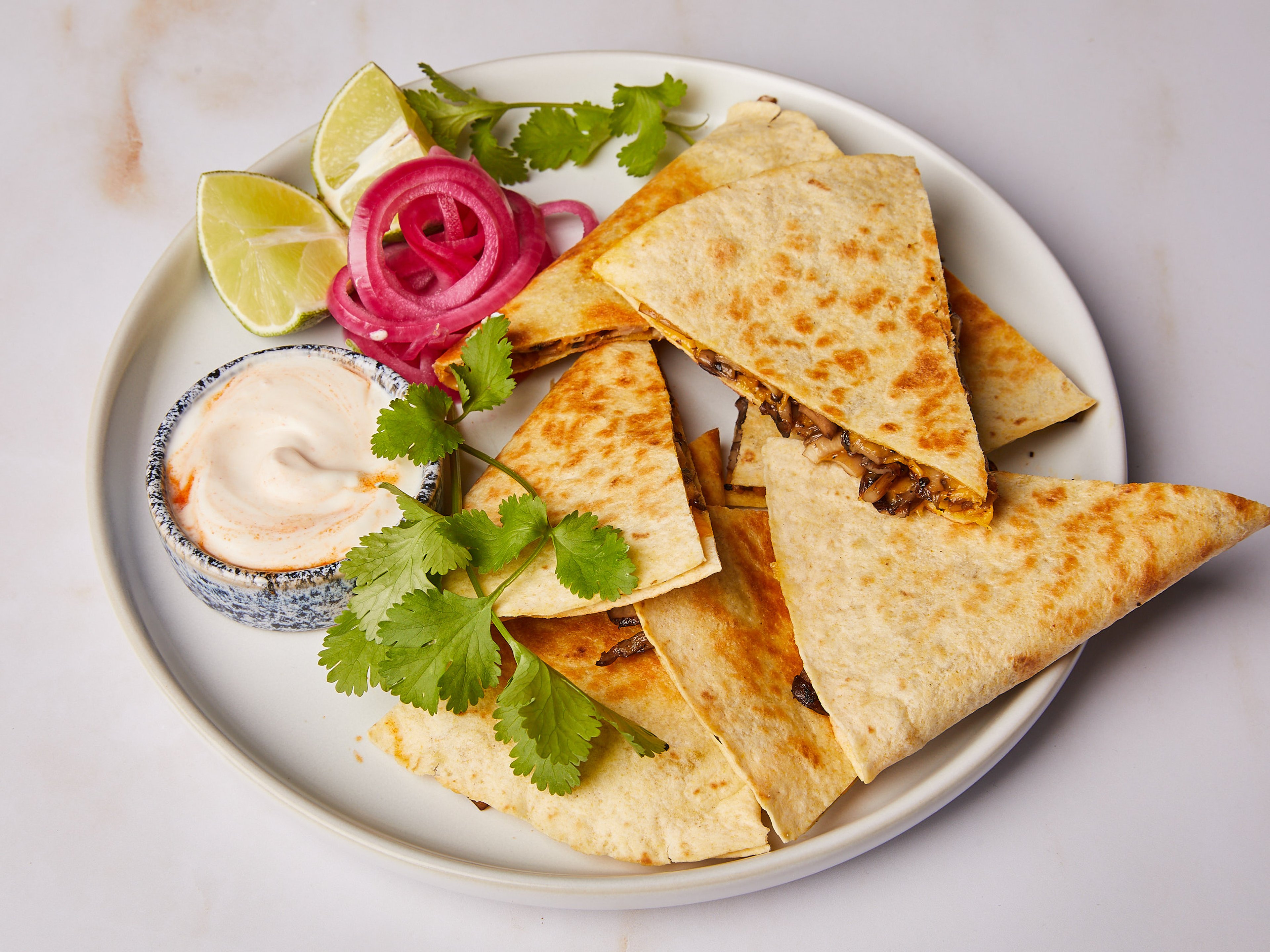 5-ingredient mushroom quesadillas with spicy sour cream