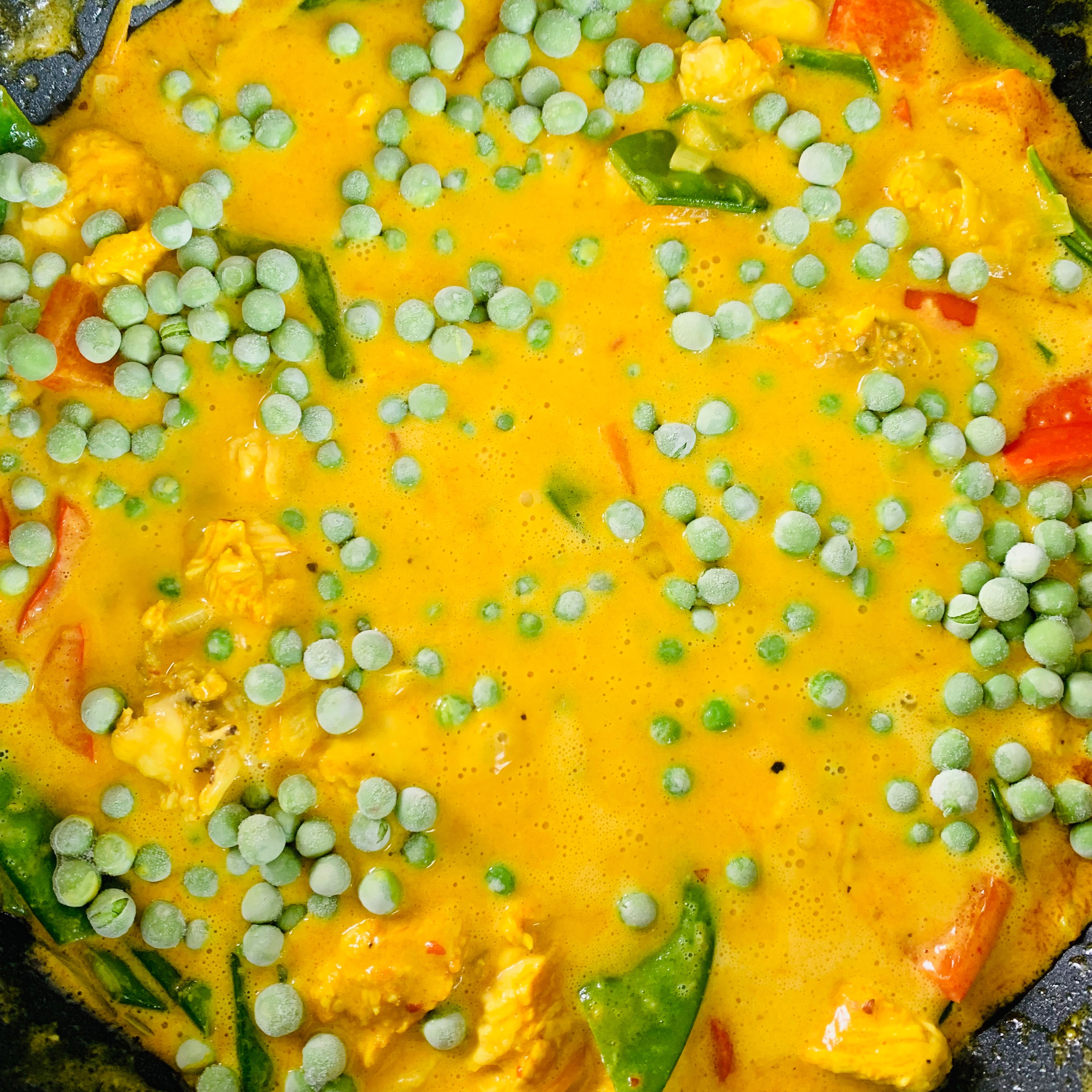 Add the frozen peas as well and simmer for 5-7 minutes 