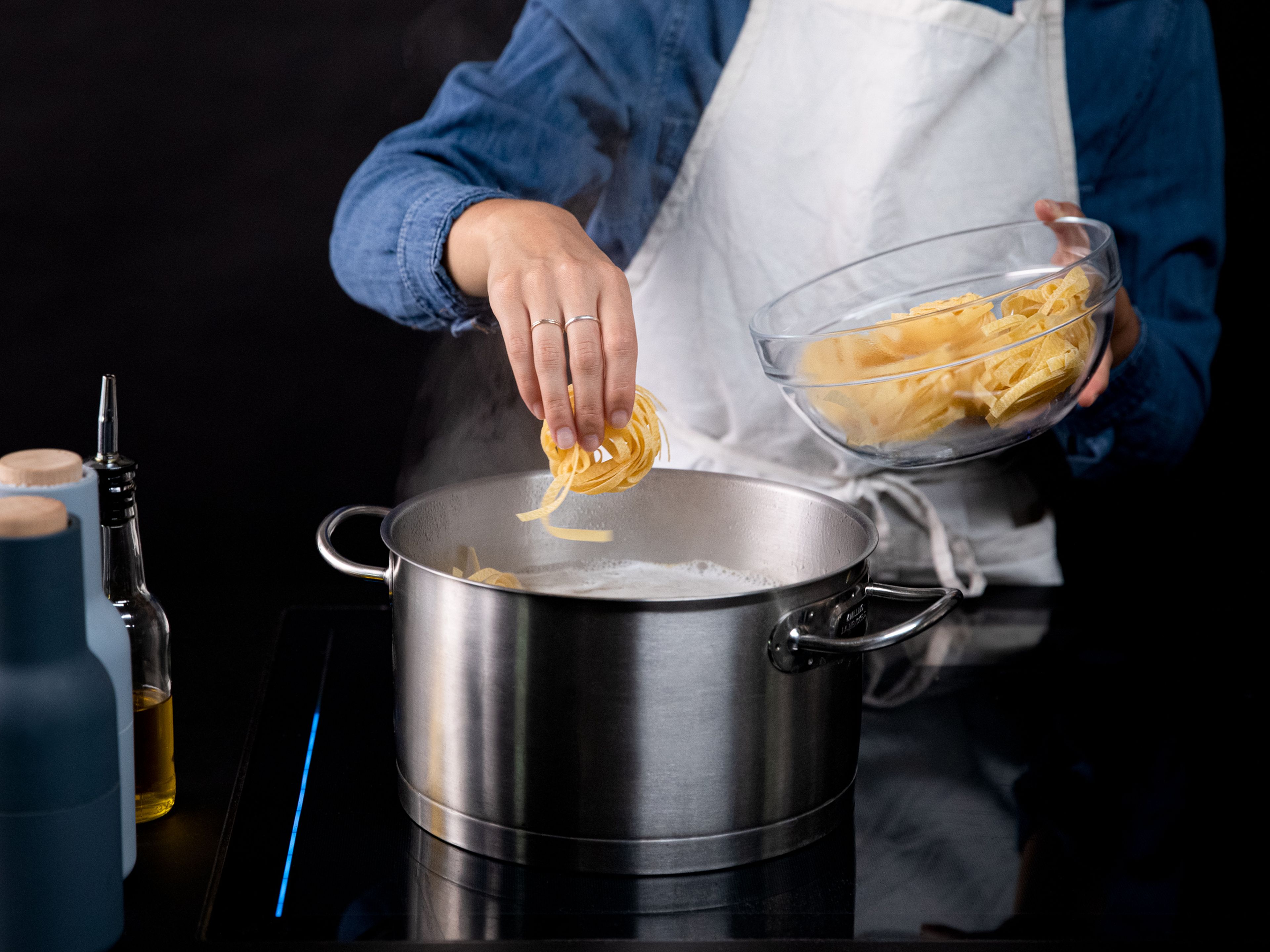 Bring a large pot of water to boil, season generously with salt, and cook tagliatelle according to the package instructions. Drain, reserving some pasta water.