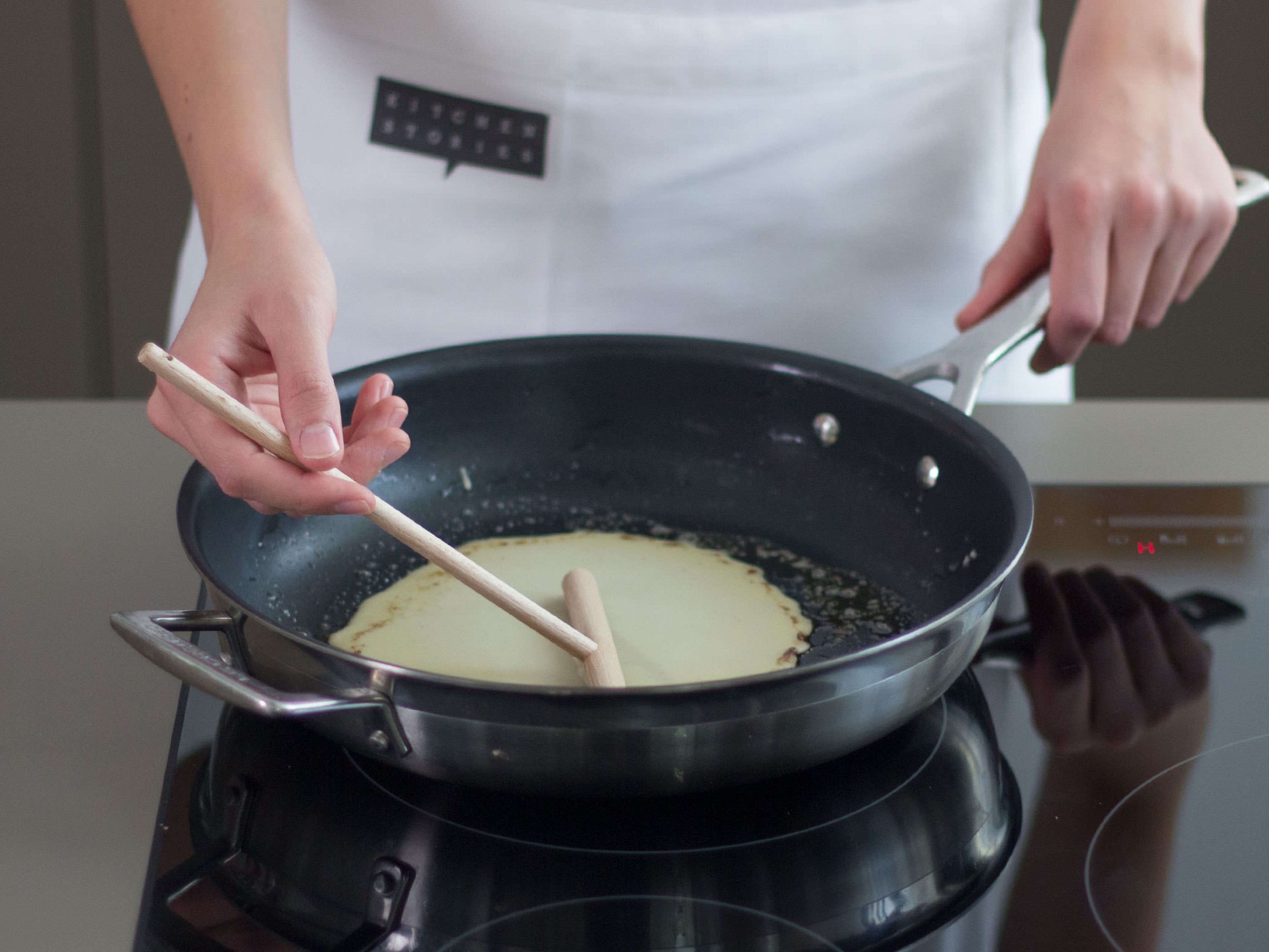 Melt some butter in a large frying pan over medium-high heat and cook crepes for approx. 1 min. per side until golden brown. Transfer to a plate and let cool completely.