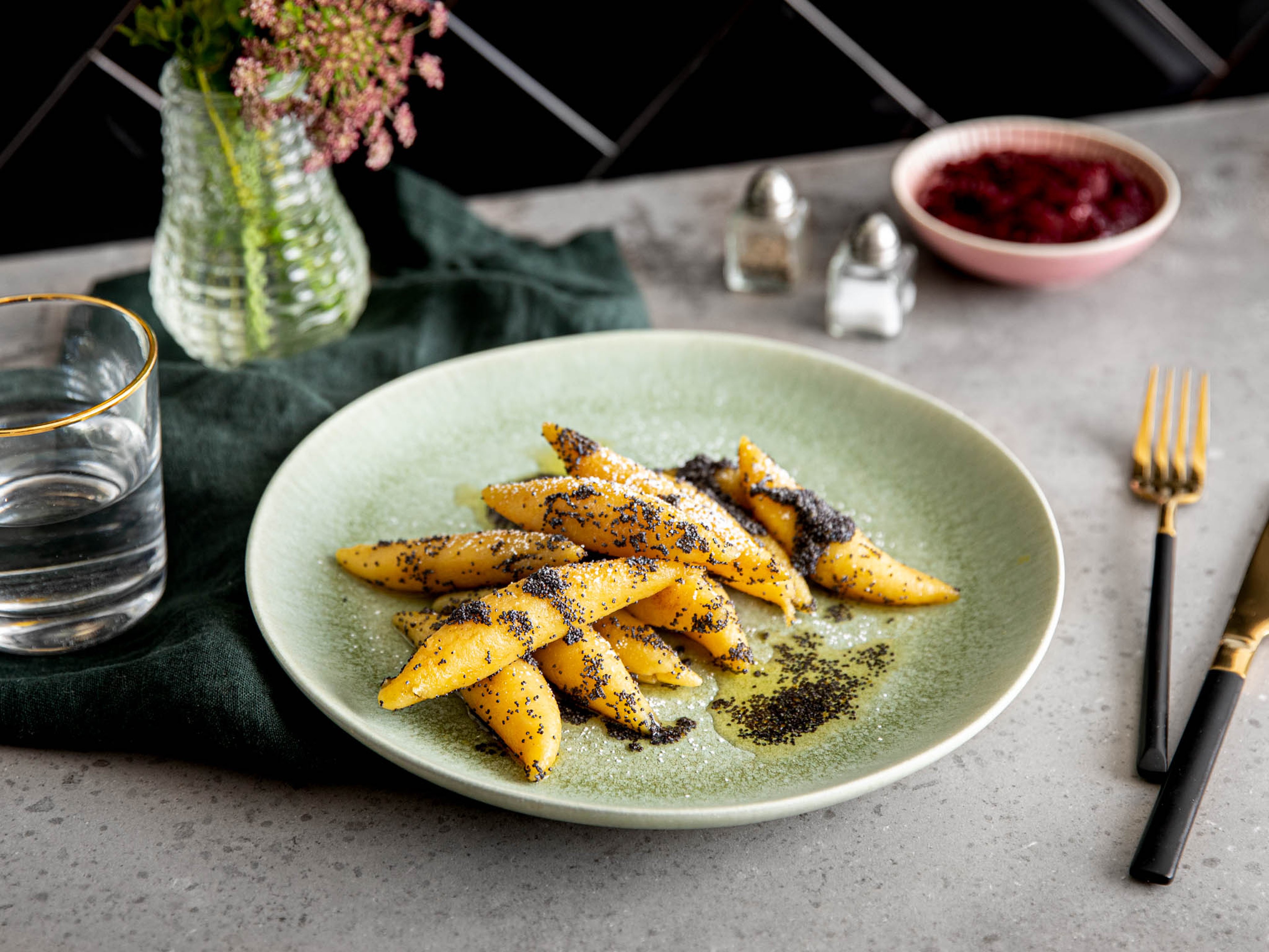 Schupfnudeln (German potato dumplings) with poppy seeds and plum jam