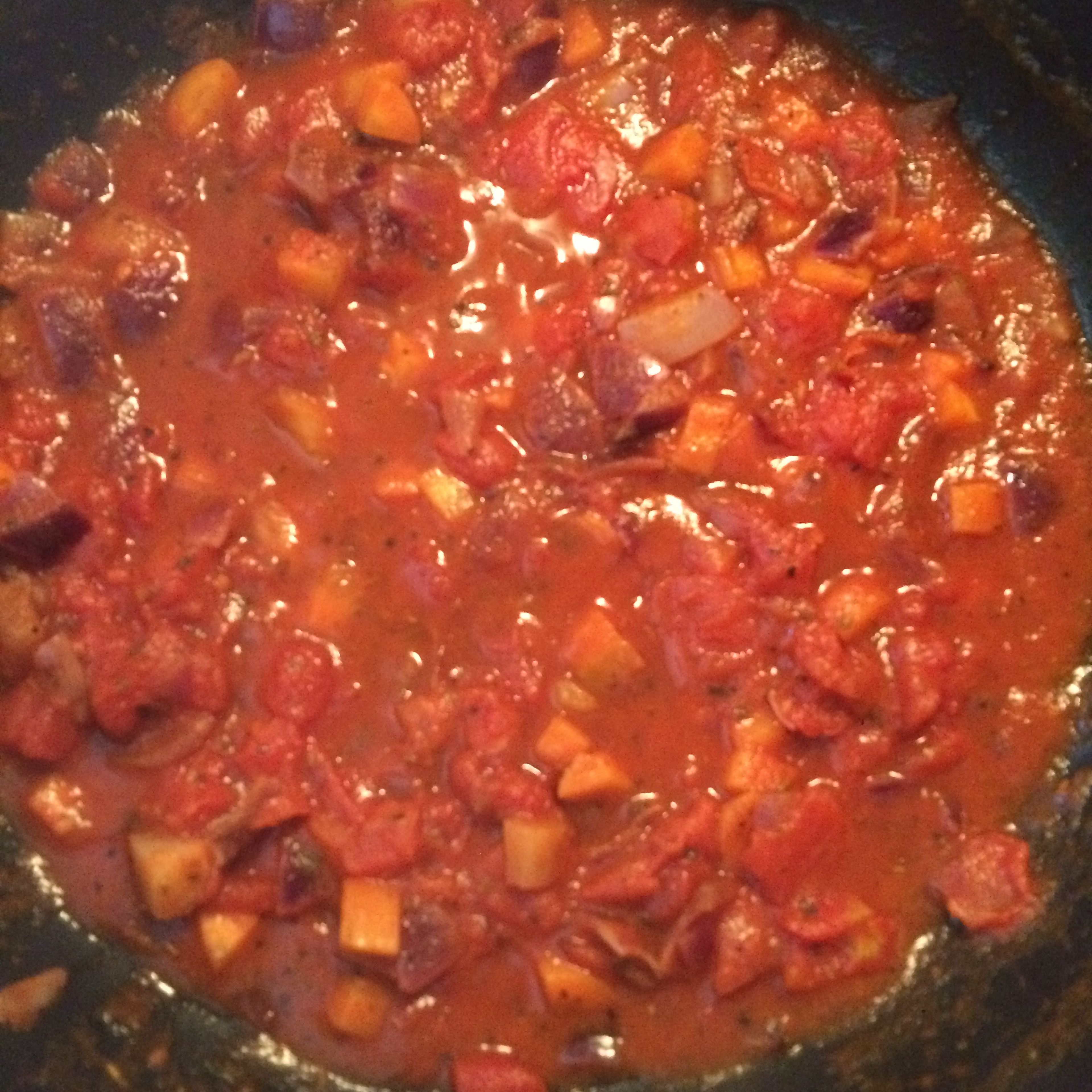Add tomato sauce, salt and curry. Cook over low heat for 30 minute