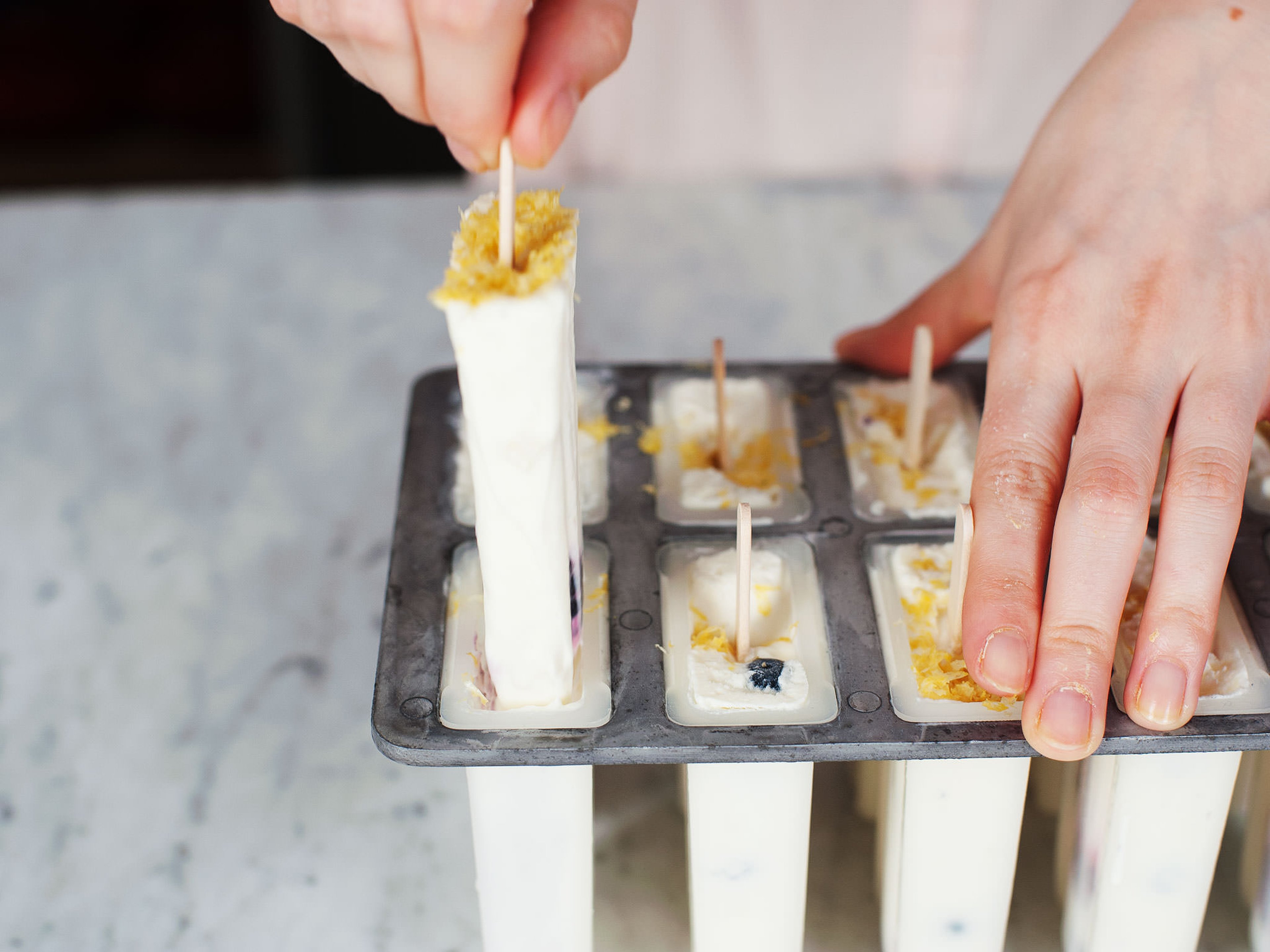 White chocolate and berry popsicles