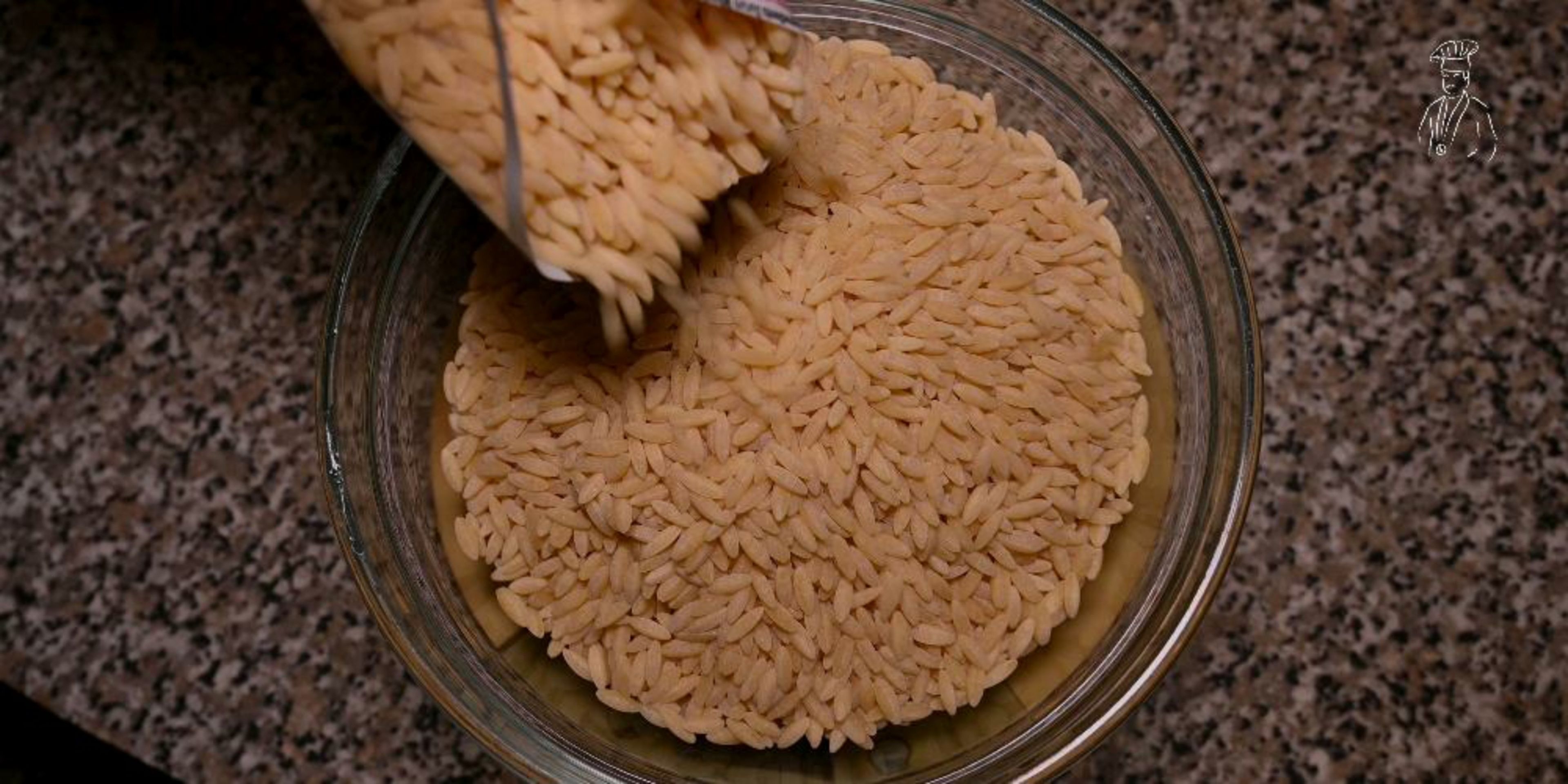 Cook the Orzo pasta in boiling water for 10-12 minutes, till the pasta is cooked and has a soft texture. 

Once the Orzo pasta is cooked, strain the water.