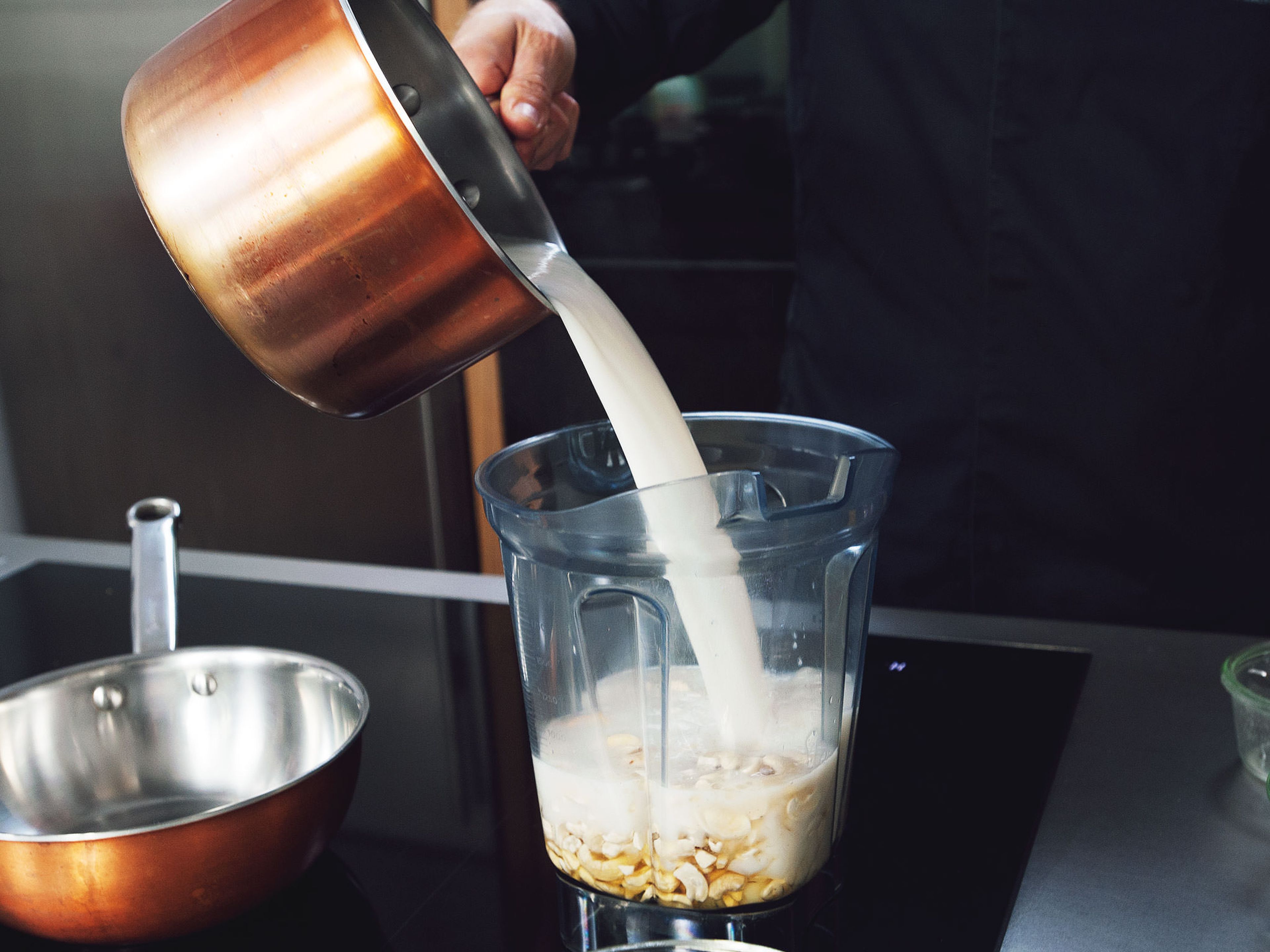 Add cashews, liqueur, salt, vegetable oil, agave nectar, and rice milk mixture to blender; mix on high speed for approx. 1 – 2 min. until smooth and creamy.