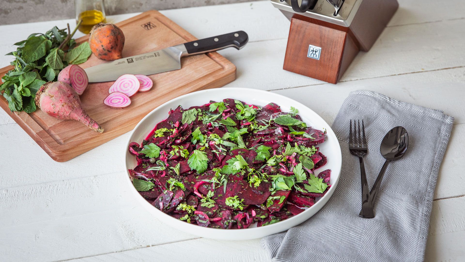 Simple beet carpaccio with mixed herbs