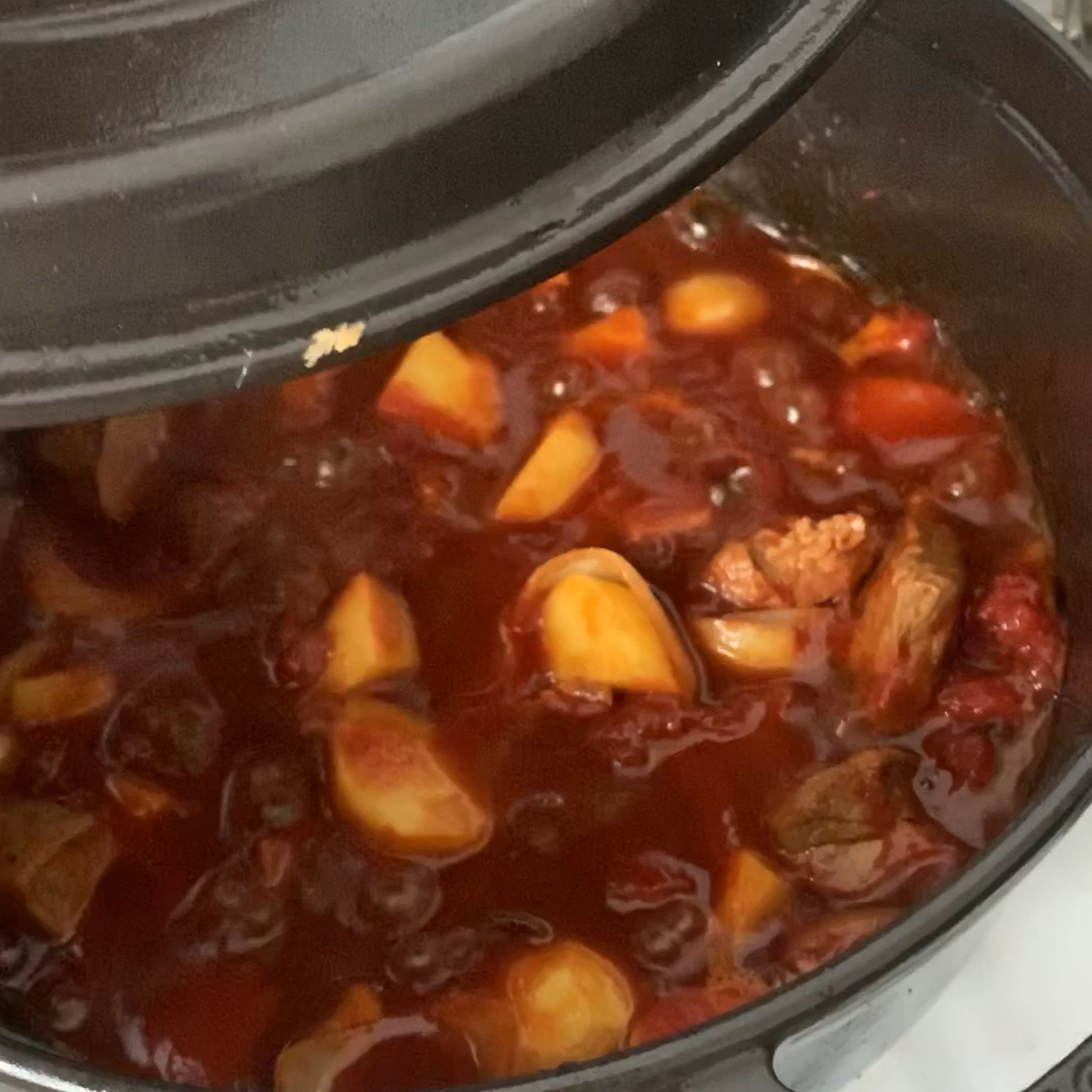 When the stew is done, season with salt, or some oyster sauce to your liking. Garnish with scallion and serve with rice.