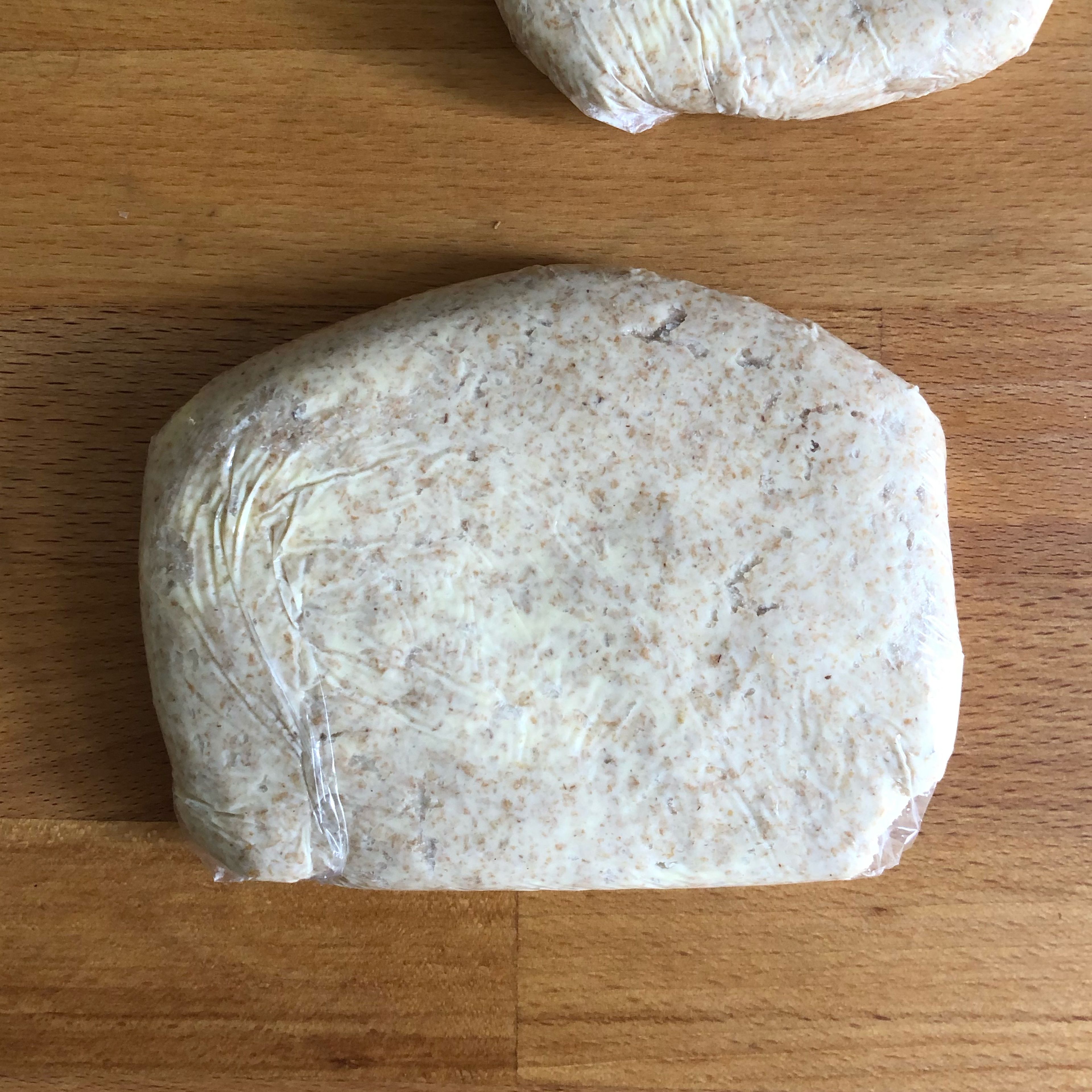Mix sourdough starter, flour, butter, and salt in a bowl to form a sticky dough. Split dough in half and wrap each half loosely in plastic wrap. Form into a flat rectangle-ish shape, transfer to the fridge and let chill for at least 30 min.