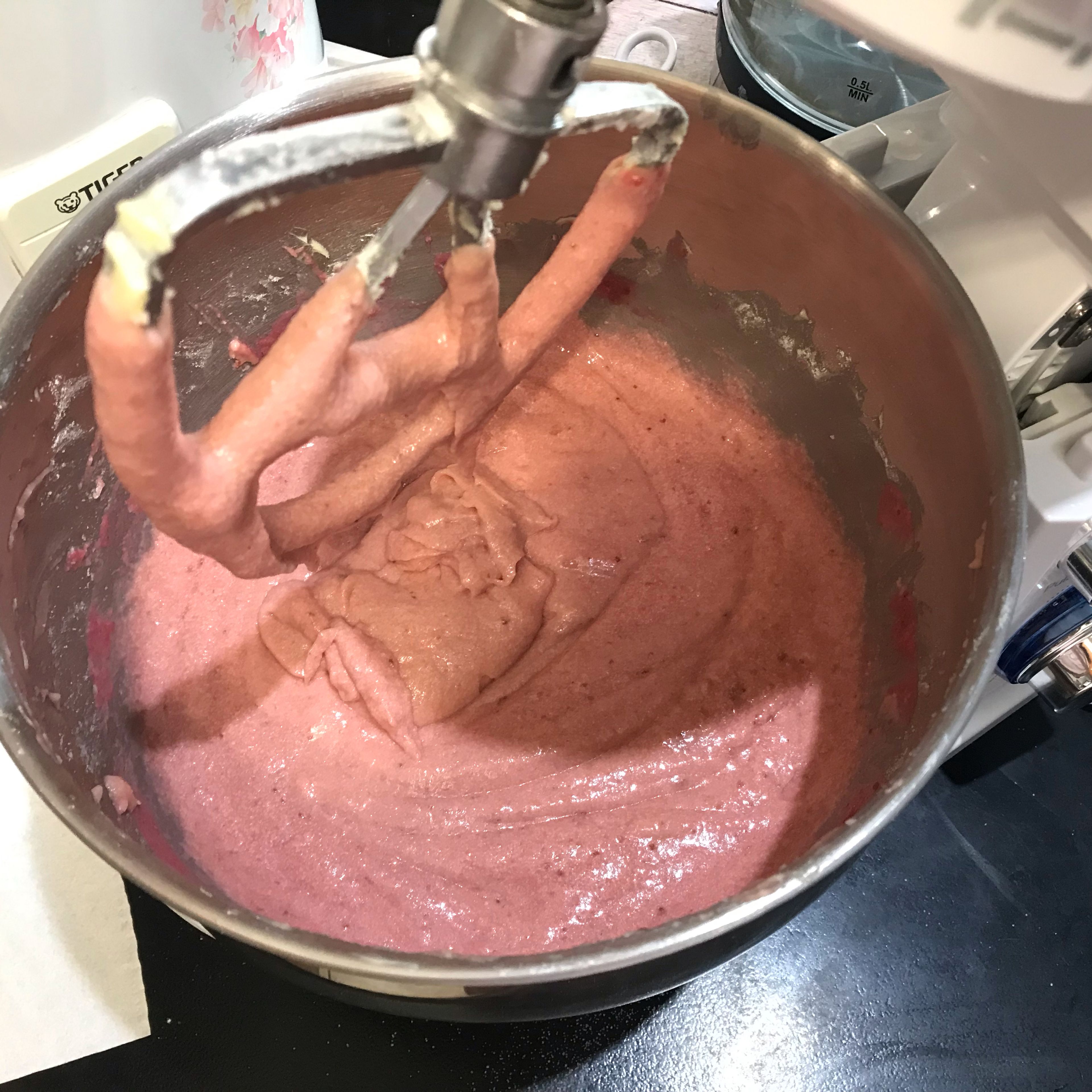 Repeat the process 2 more times with the remaining flour mixture and milk mixture. When the batter appears blended, stop the mixer and scrape the sides of the bowl with a rubber spatula. If it looks like ice cream, you did it right!