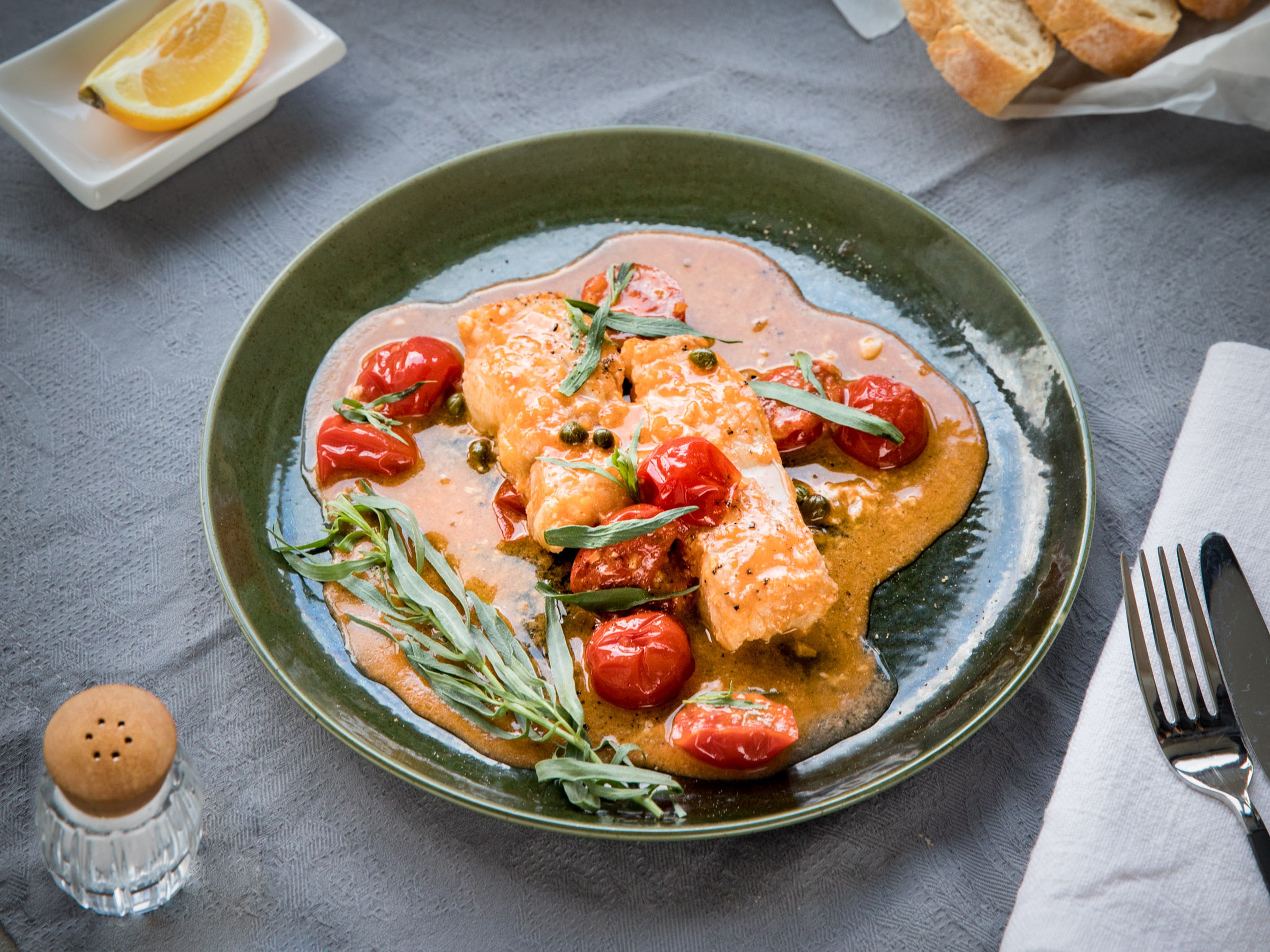 Poached cod in tomato sauce