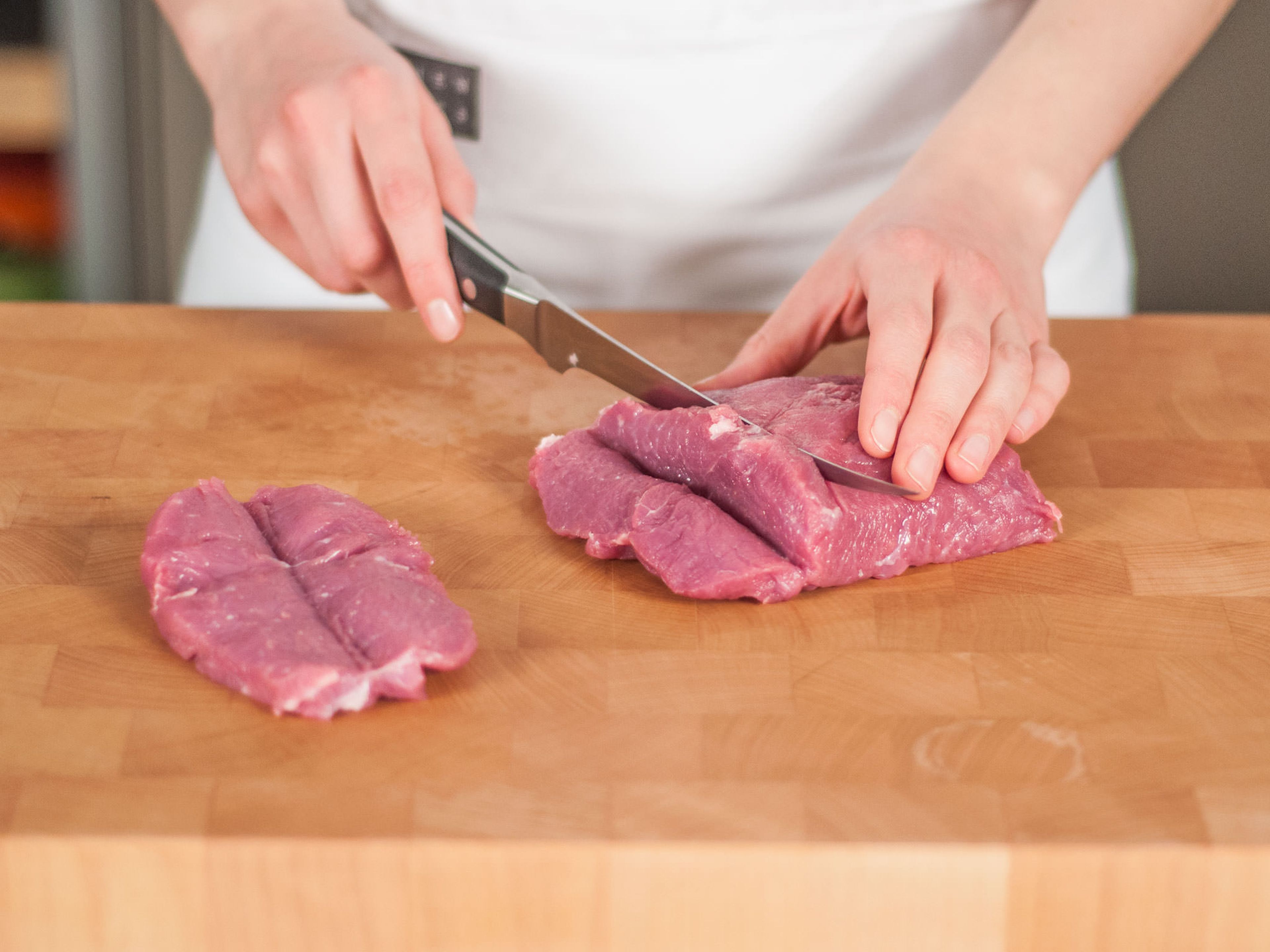 Cut veal into approx. two finger thick butterflied portions.