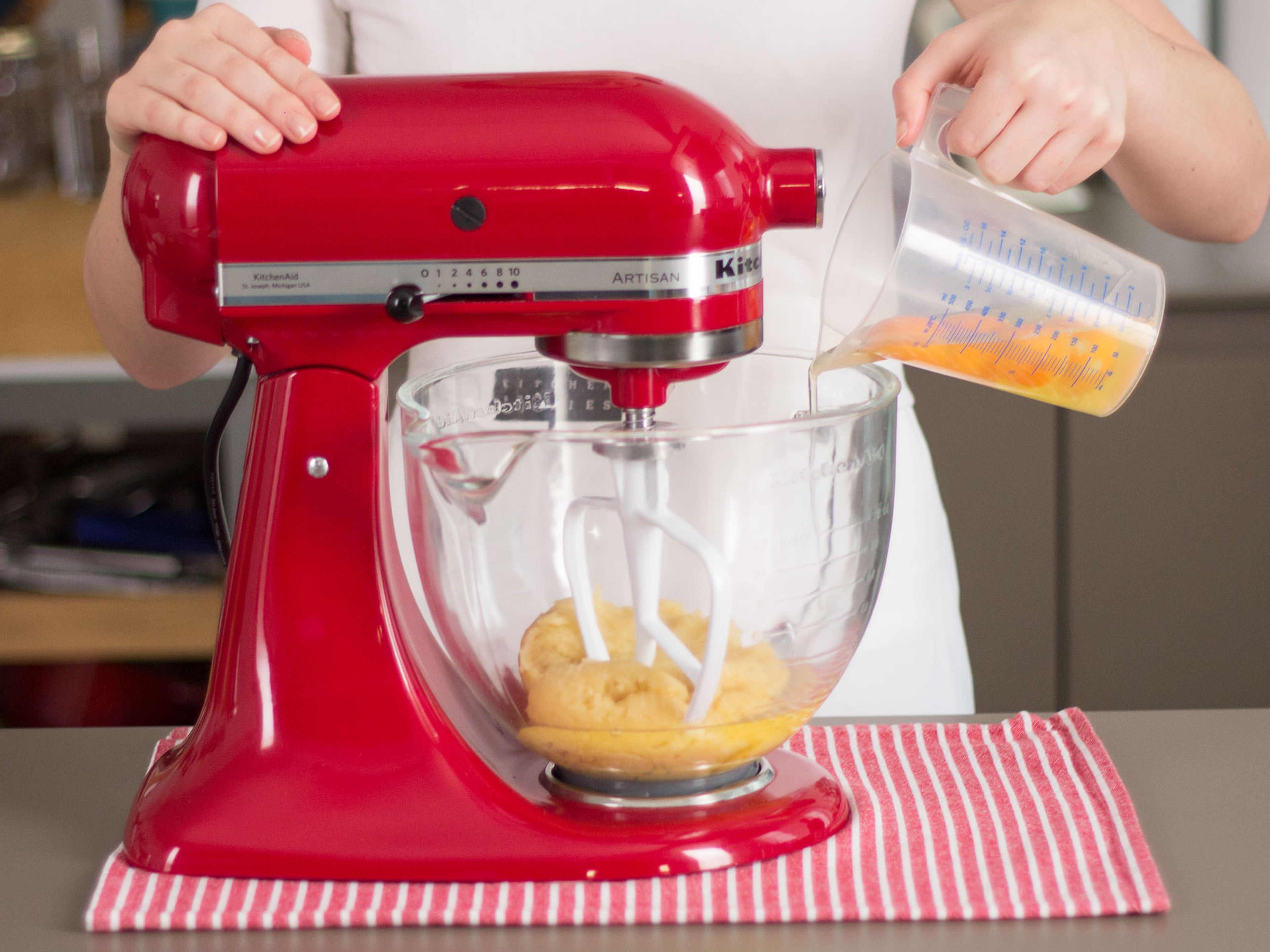 Add eggs to stand mixer and beat until well incorporated and dough is smooth. Transfer dough to a star-tipped piping bag.