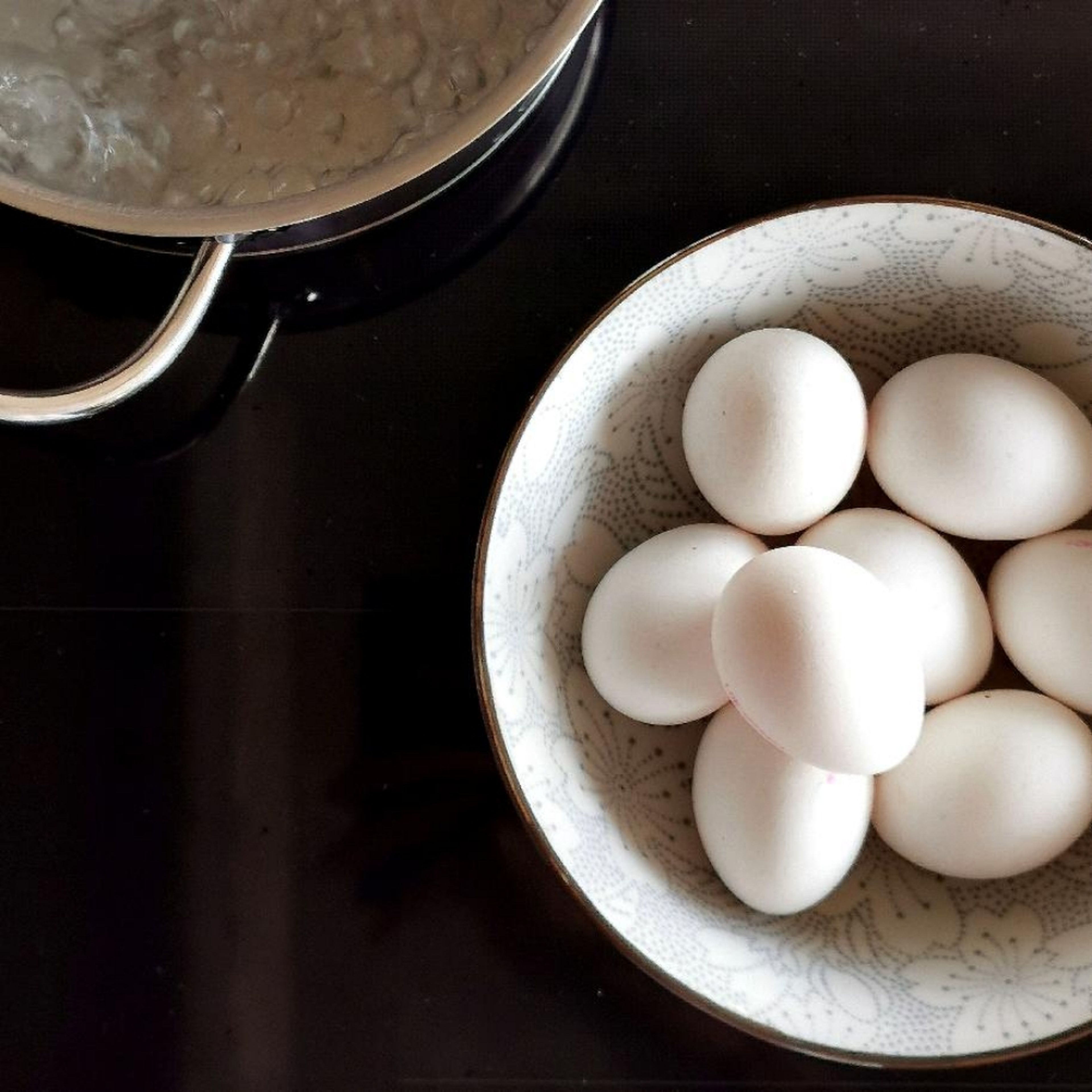 Cook eggs in boiling water for approx. 8 min., then drain and peel.