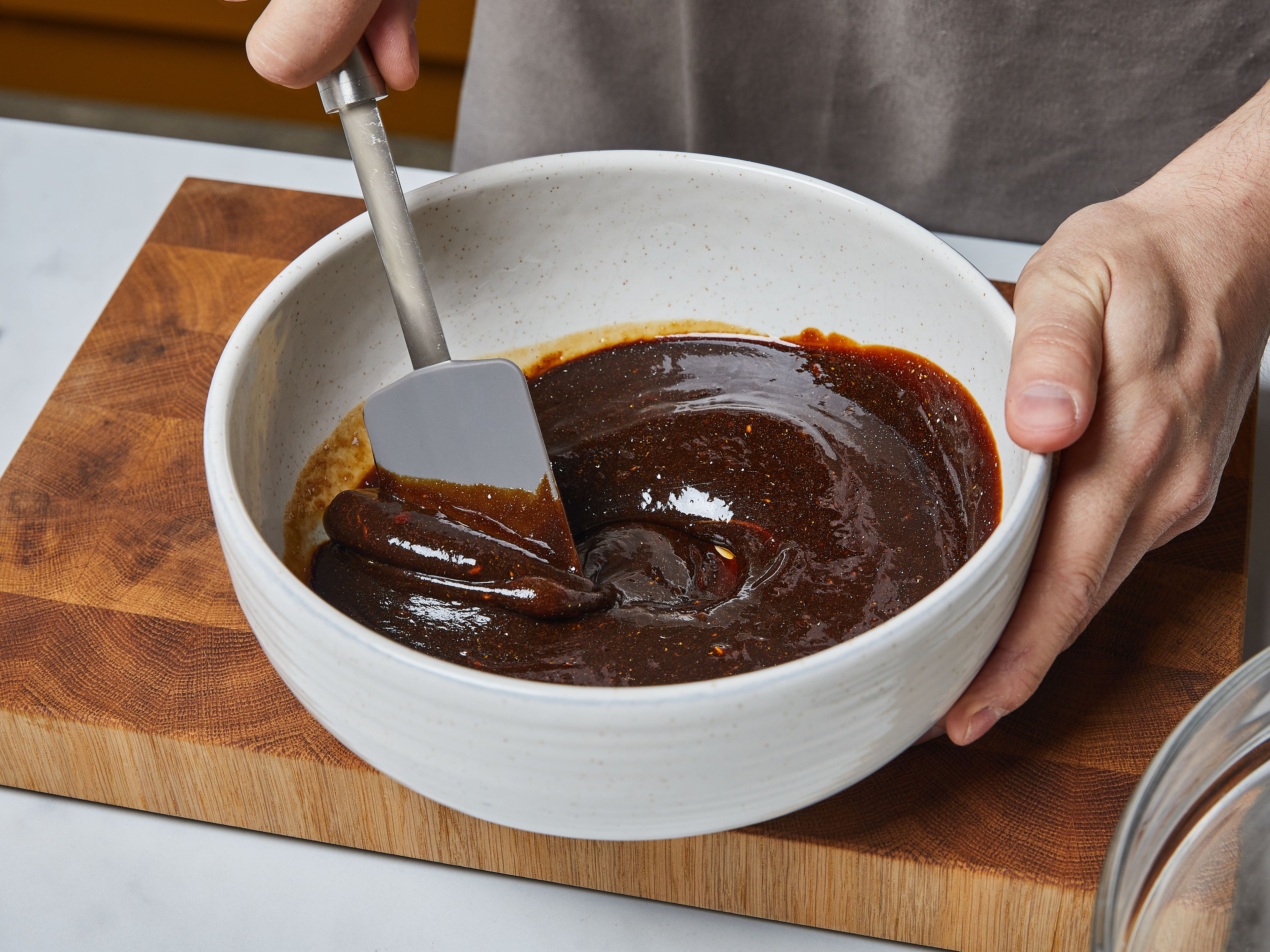 Mix flour, salt and gingerbread spice in a large bowl. In another large bowl, mix together the room temperature margarine, golden syrup, and applesauce until well combined.