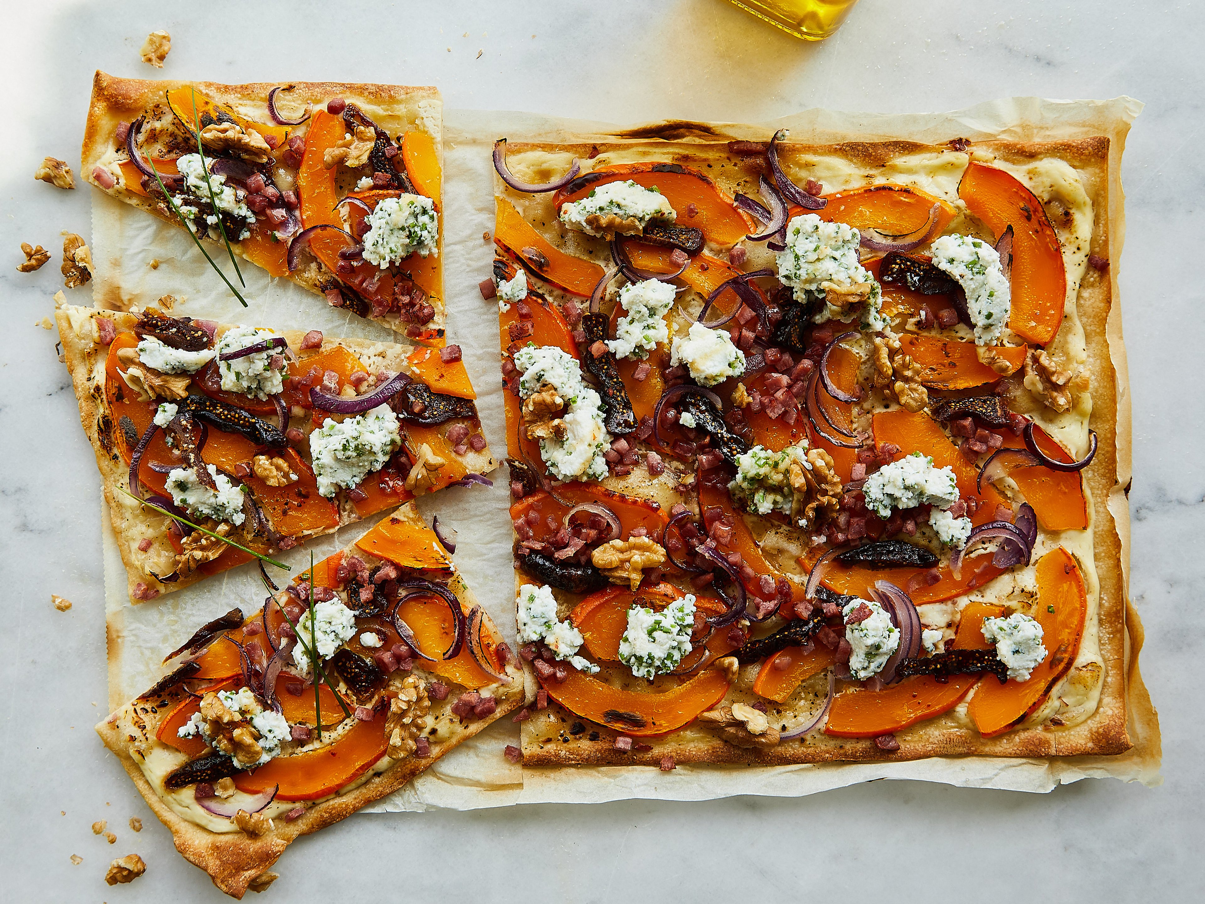 Pumpkin tarte flambée with figs and bacon