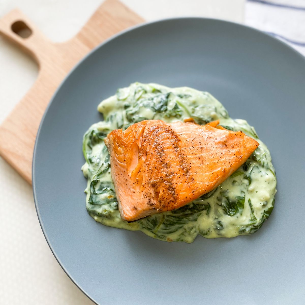 Salmon with creamy spinach | Recipe | Kitchen Stories
