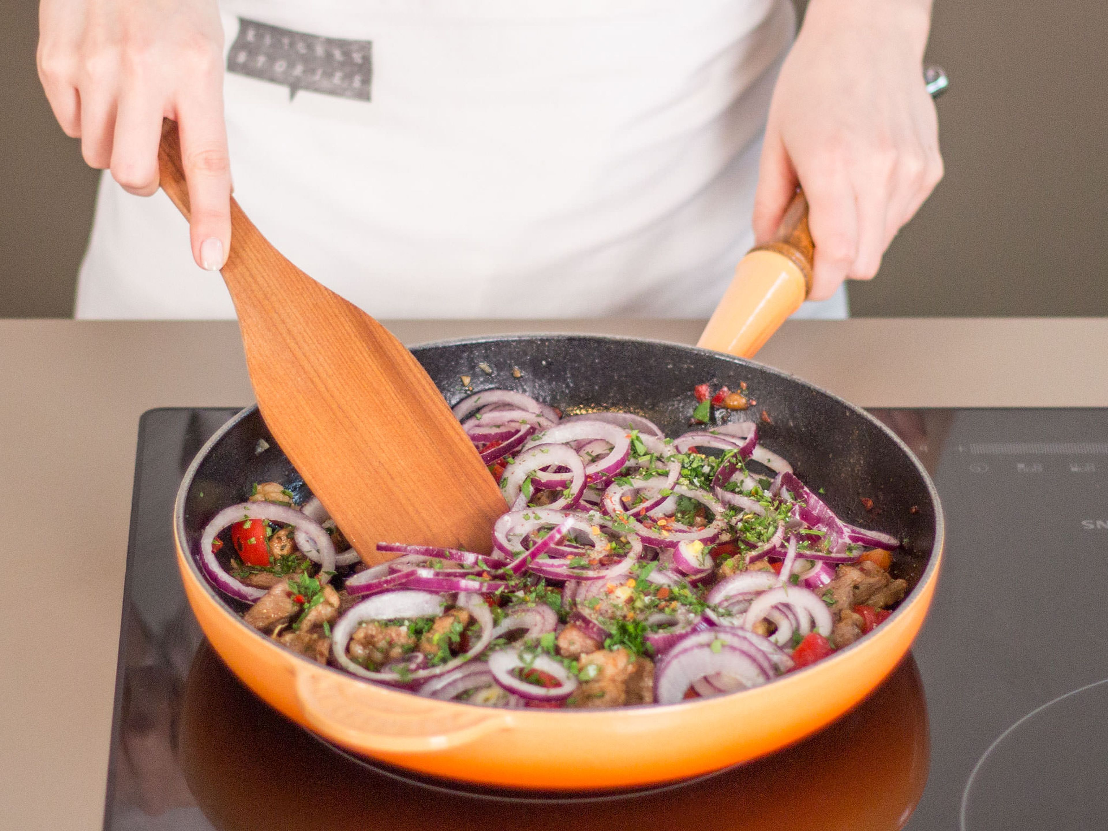 In a large frying pan, sauté meat in some vegetable oil over medium heat for approximately 3 – 4 min. Then, add chili and rest of the garlic and continue to cook for another 1 – 2 min. Finally, add onion and bell pepper, stir well to combine, and cook for another 2 – 3 min. Remove from heat and season to taste with salt, pepper, and paprika powder. Garnish with oregano and serve with tzatziki on the side. Enjoy!