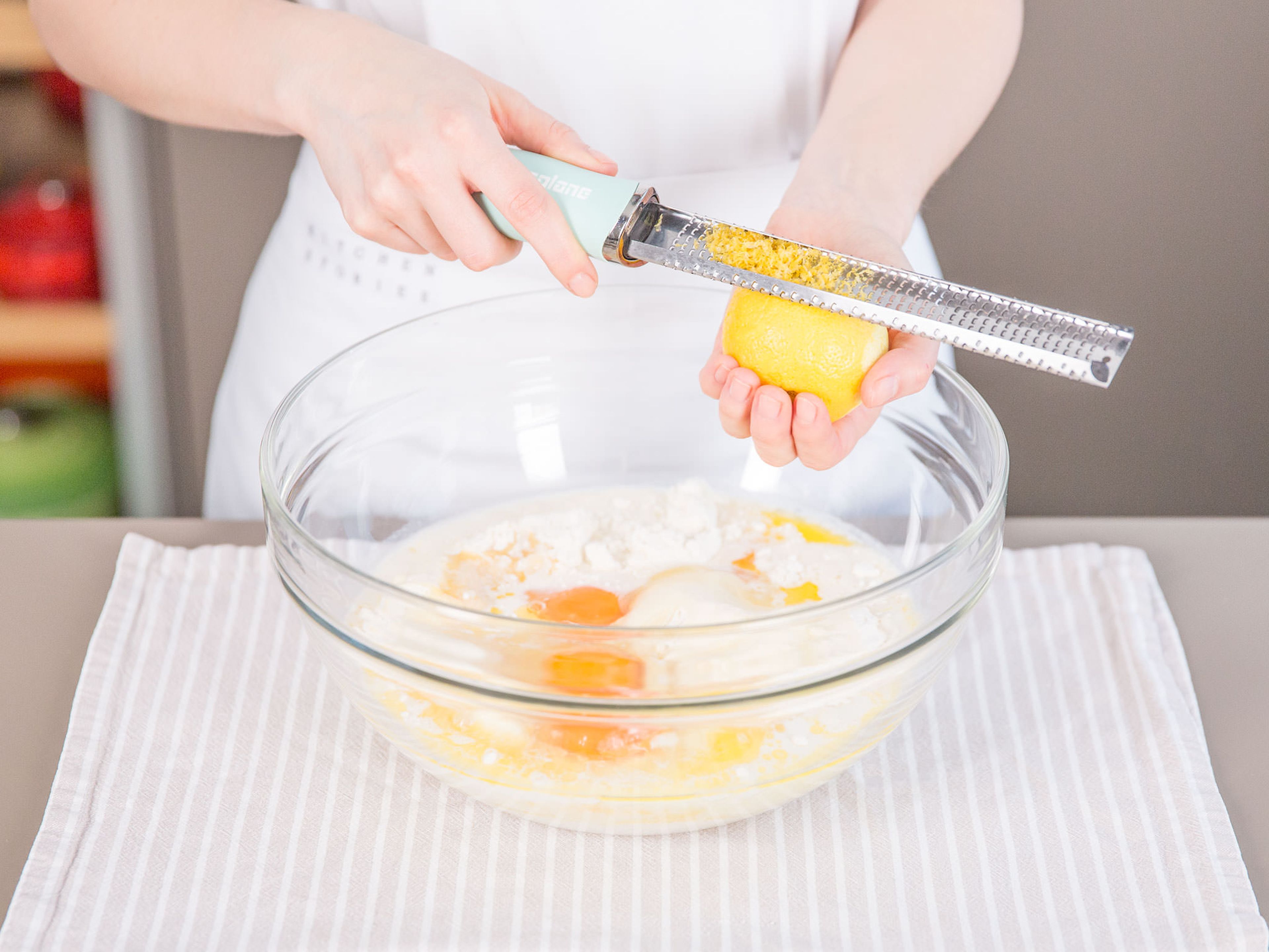 In a large bowl, whisk together flour mixture with milk, eggs, melted butter, and lemon zest until smooth. For best results, cover bowl with plastic wrap and set aside to rest for at least an hour or refrigerated overnight.