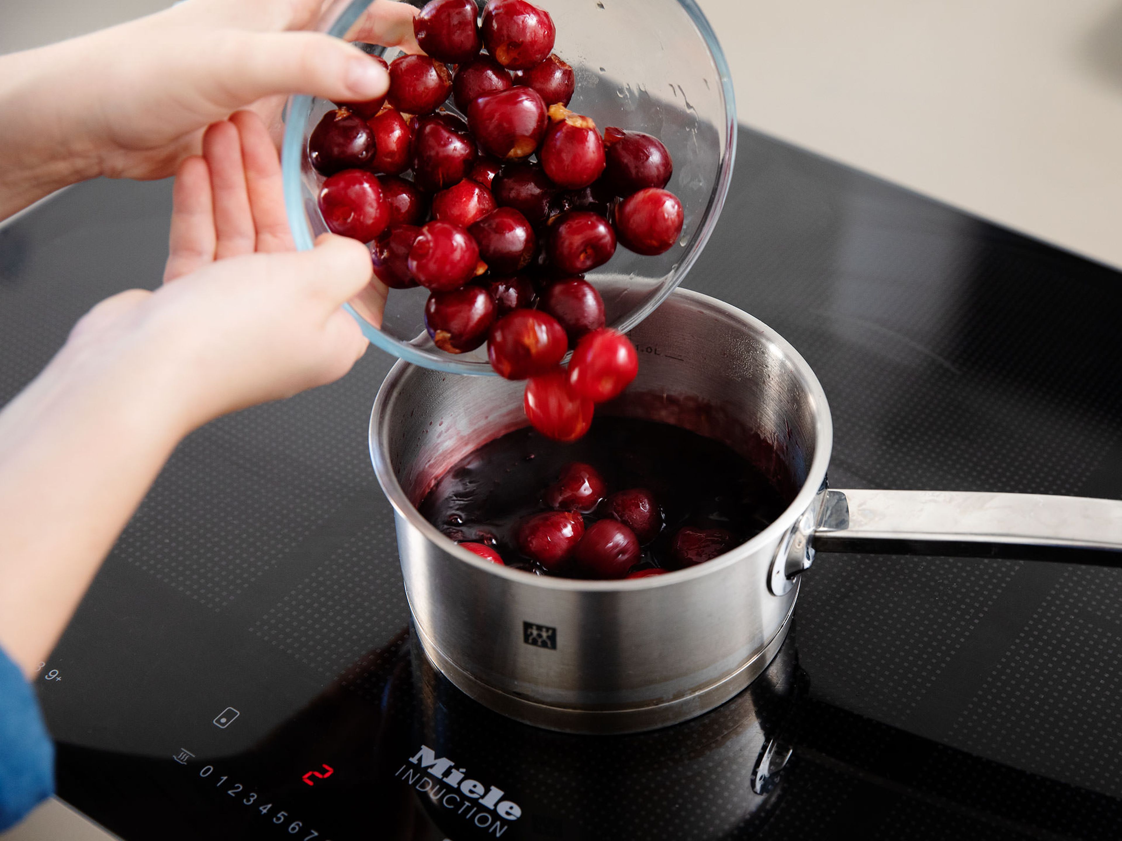 Using a knife, halve cherries and remove the pits. In a small pot, mix cherry juice, bourbon, and starch. Add a portion of the vanilla sugar and cherries and heat over medium-high heat, stirring occasionally, until the cherry mixture has thickened. Transfer to the fridge and allow to cool until serving.