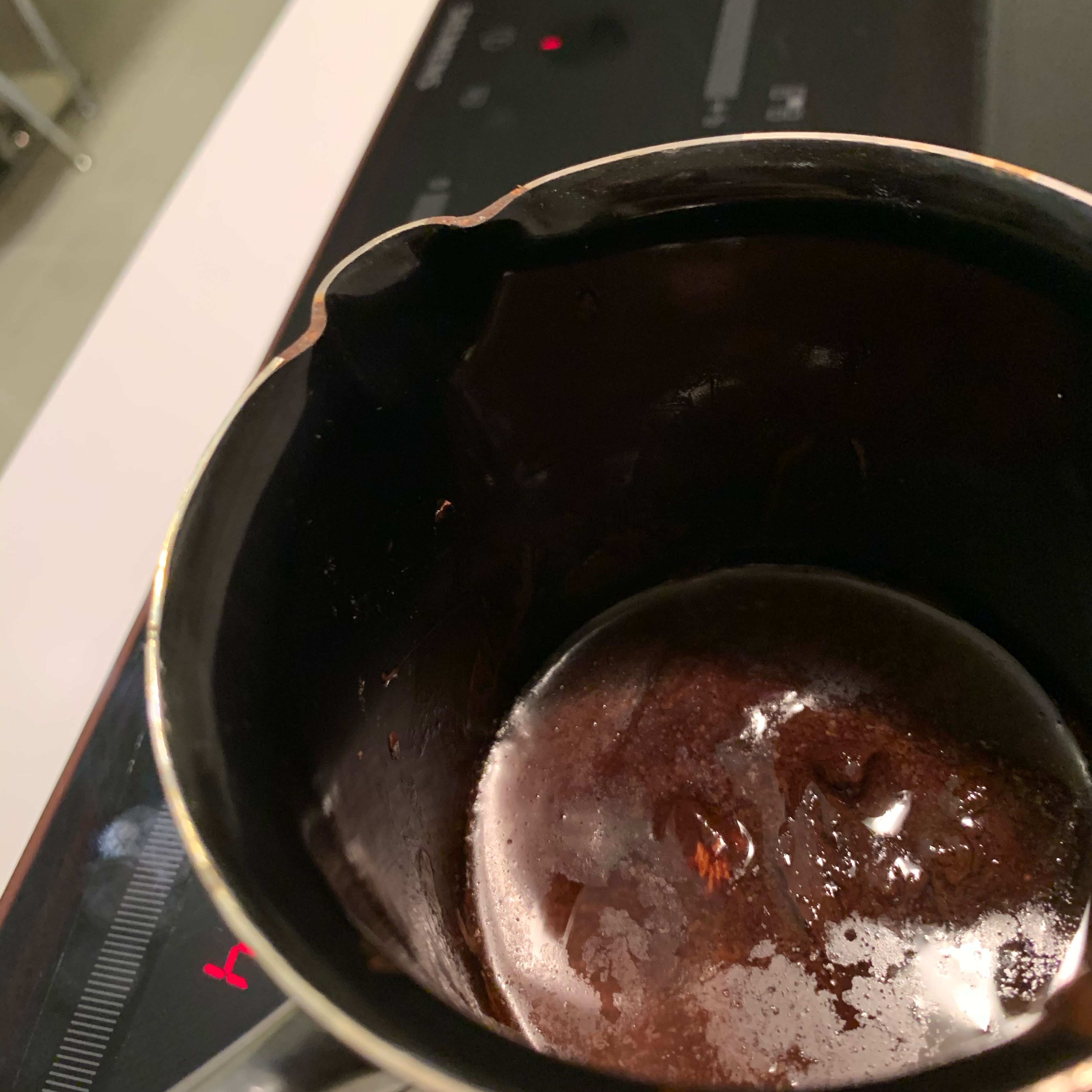 Put the chocolate and butter in a small pan and melt over low heat