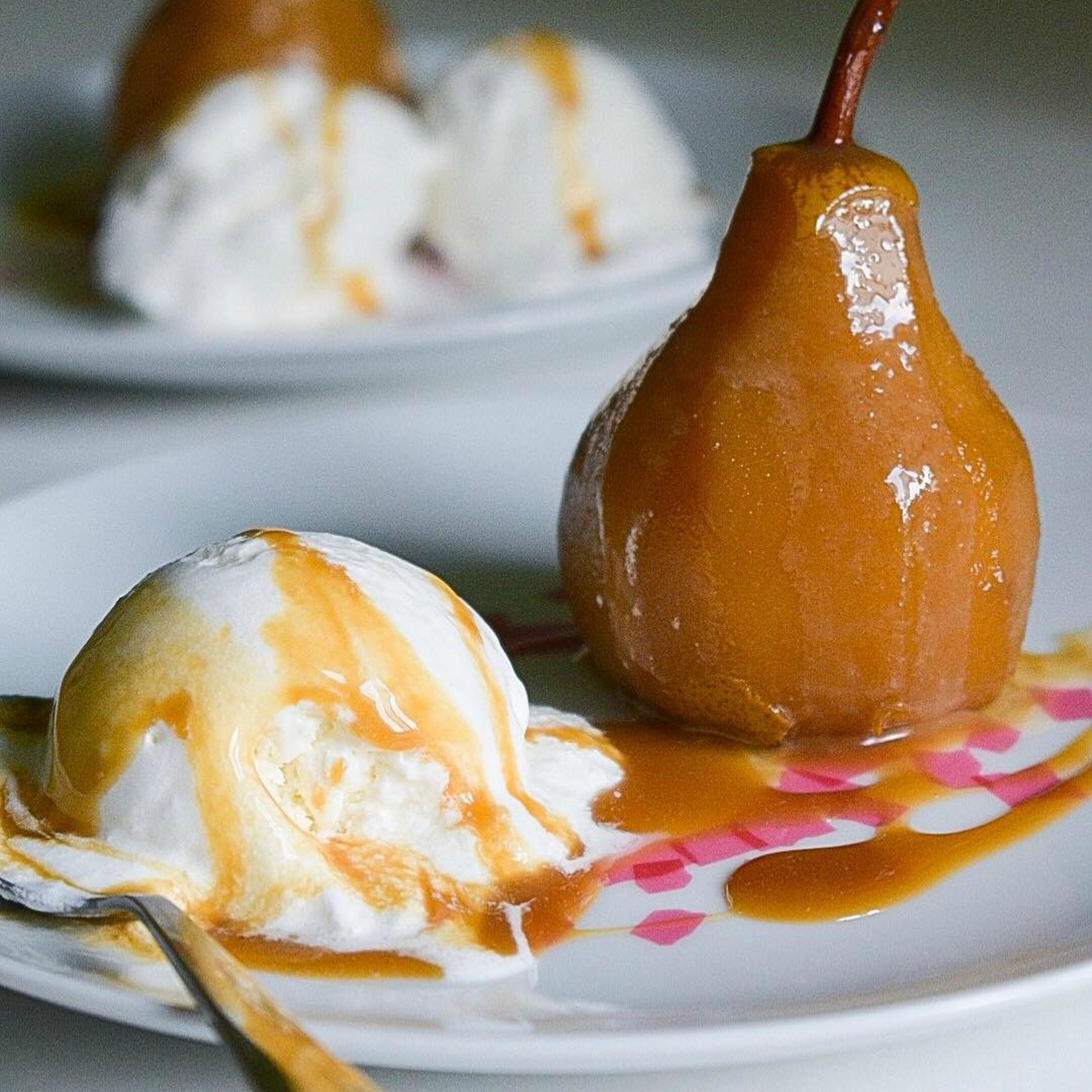Poached pear with salted caramel and vanilla icecream